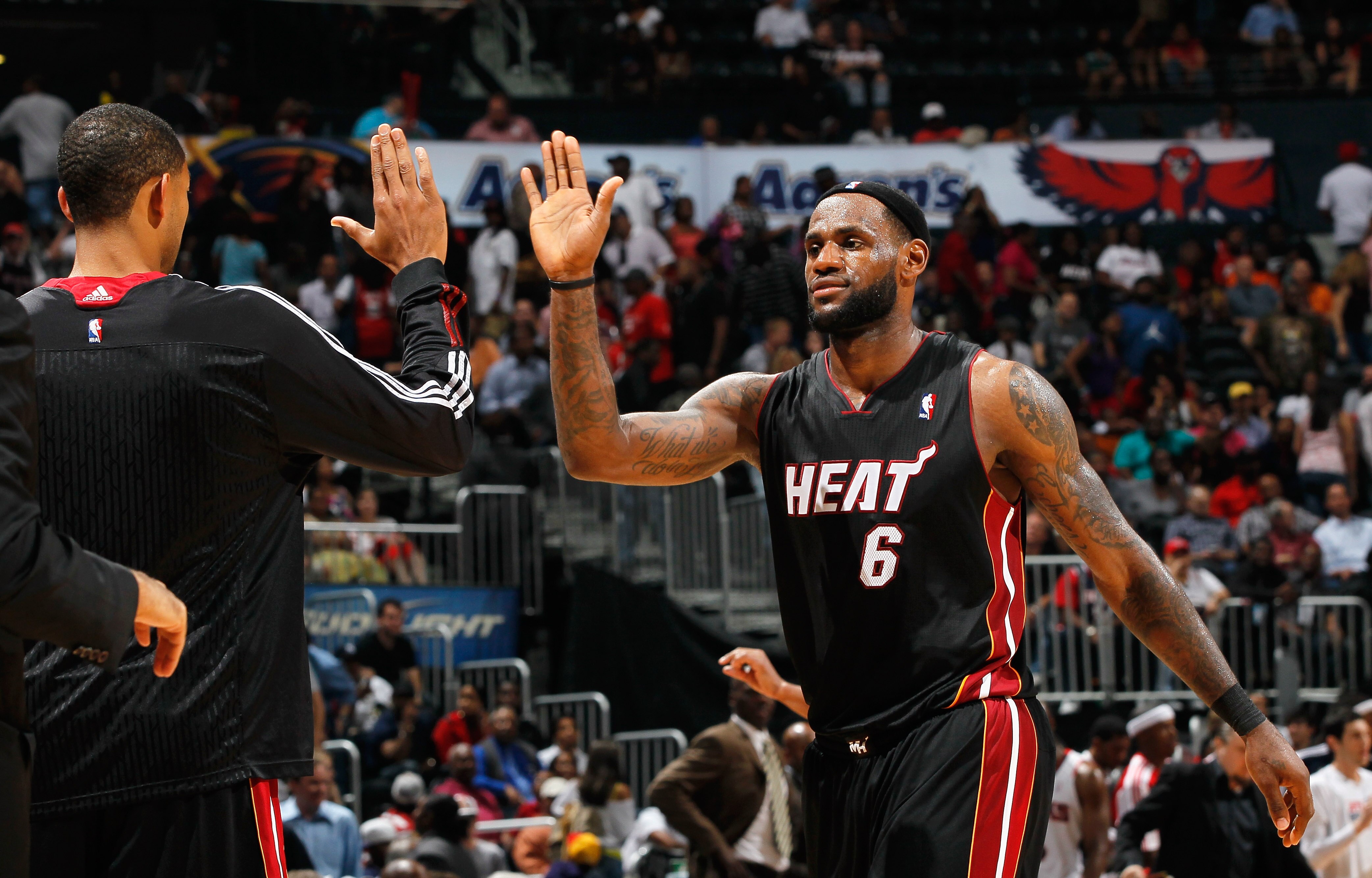 ATLANTA, GA - APRIL 11:  LeBron James #6 of the Miami Heat celebrates after a basket against the Atlanta Hawks at Philips Arena on April 11, 2011 in Atlanta, Georgia.  NOTE TO USER: User expressly acknowledges and agrees that, by downloading and/or using