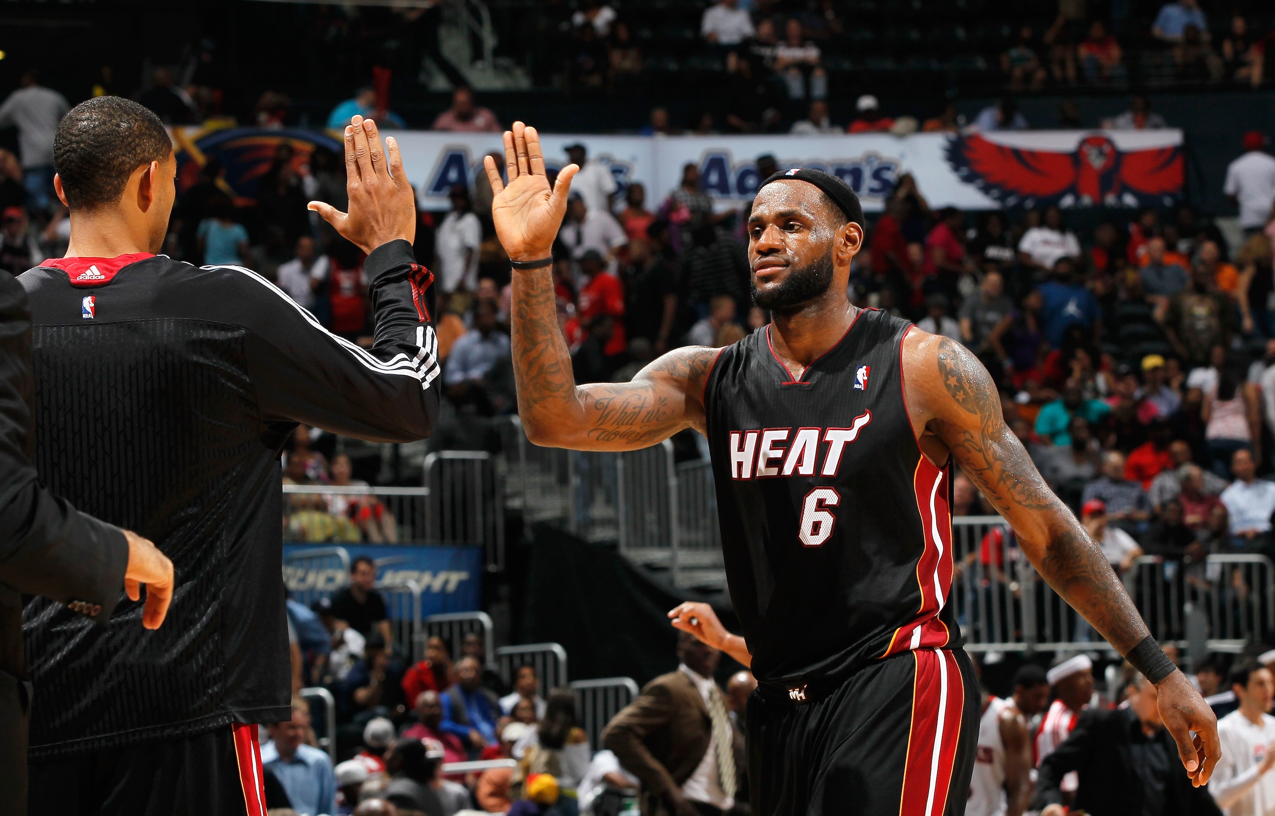 ATLANTA, GA - APRIL 11:  LeBron James #6 of the Miami Heat celebrates after a basket against the Atlanta Hawks at Philips Arena on April 11, 2011 in Atlanta, Georgia.  NOTE TO USER: User expressly acknowledges and agrees that, by downloading and/or using