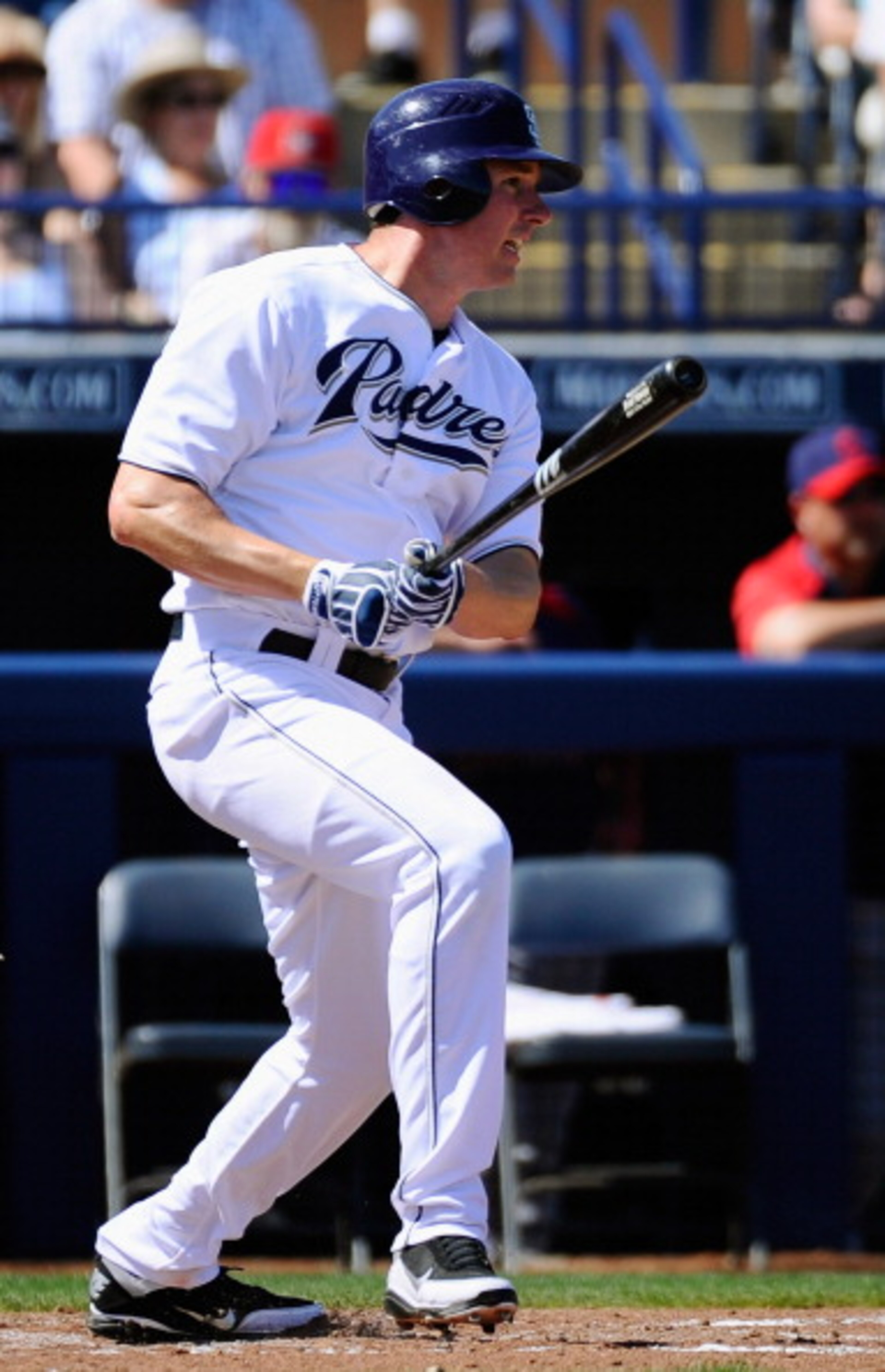 PEORIA, AZ - MARCH 13: Brad Hawpe #11 of the San Diego Padres grounds out against the Cleveland Indians during the first inning of the spring training baseball game at Peoria Stadium on March 13, 2011 in Peoria, Arizona.  (Photo by Kevork Djansezian/Getty