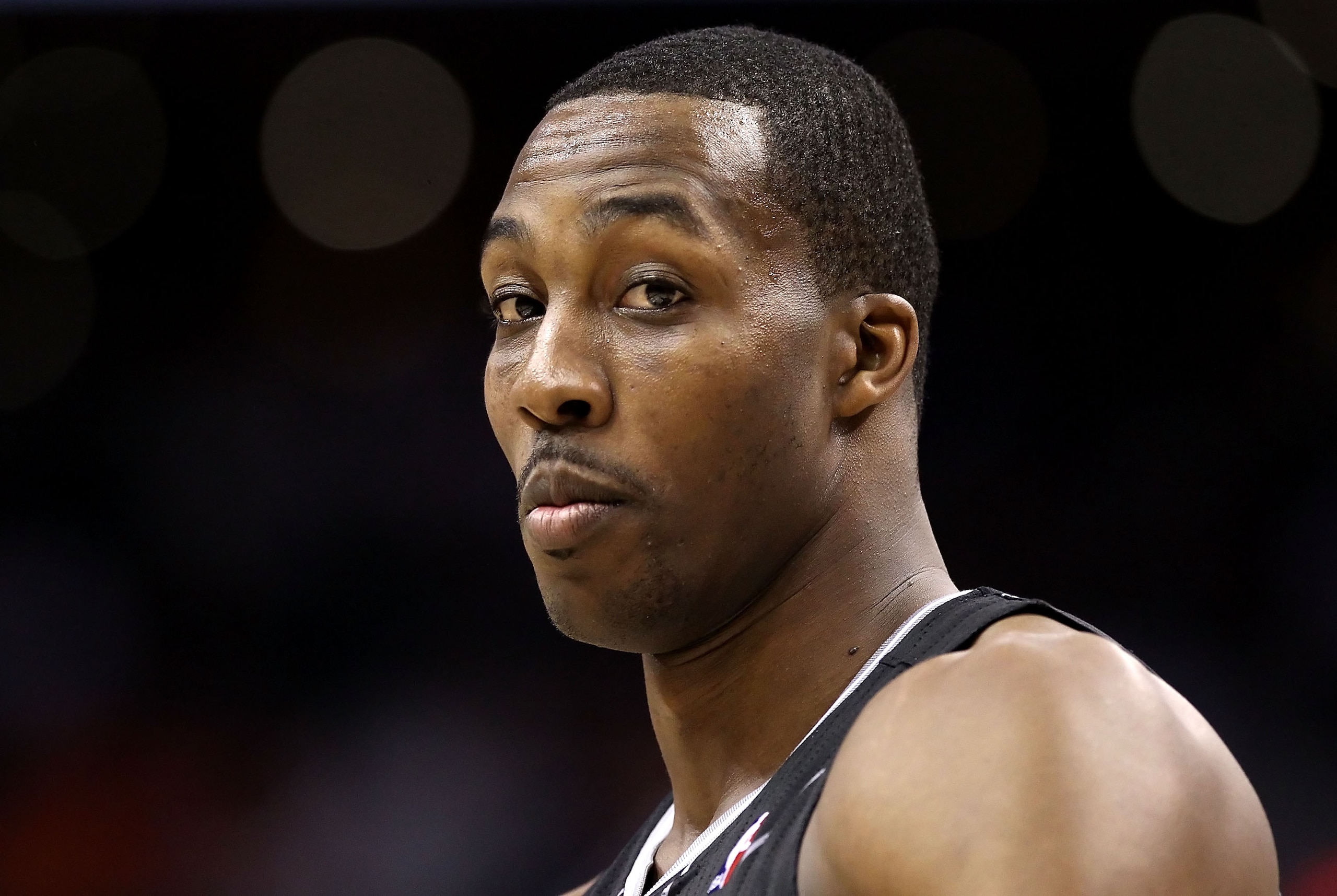 PHOENIX, AZ - MARCH 13:  Dwight Howard #12 of the Orlando Magic during the NBA game against the Phoenix Suns at US Airways Center on March 13, 2011 in Phoenix, Arizona. The Magic defeated the Suns 111-88. NOTE TO USER: User expressly acknowledges and agre