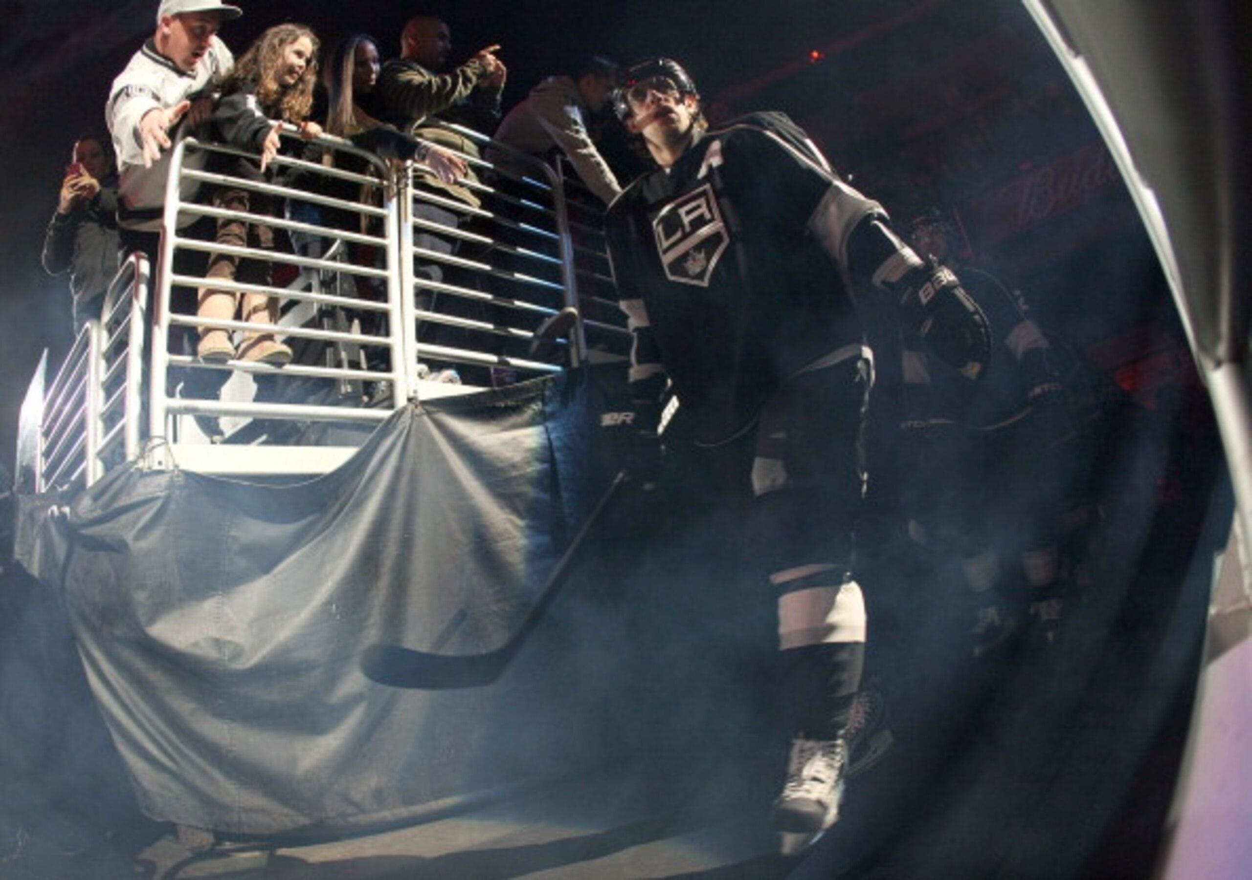 LOS ANGELES, CA - MARCH 24:  Anze Kopitar #11 of the Los Angeles Kings walks to the ice prior to the NHL game against the San Jose Sharks at Staples Center on March 24, 2011 in Los Angeles, California. The Kings defeated the Sharks 4-3 in shootout overtim