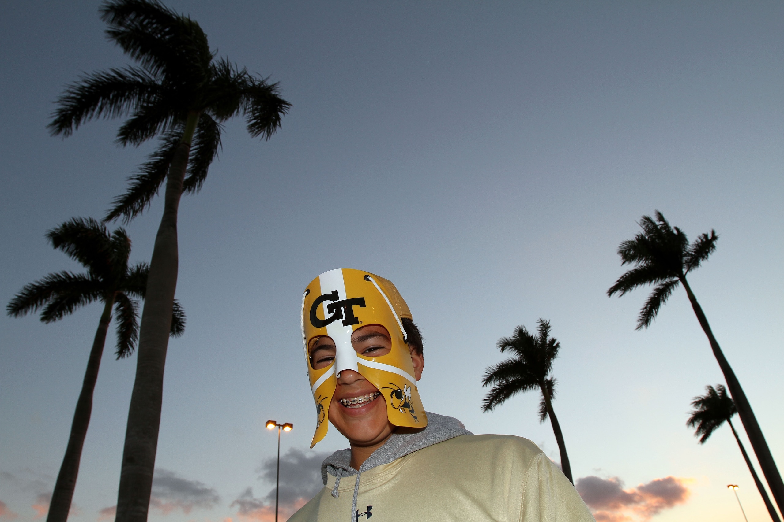 MIAMI GARDENS, FL - JANUARY 05:  A fan of the Georgia Tech Yellow Jackets shows support for his team against the Iowa Hawkeyes during the FedEx Orange Bowl at Land Shark Stadium on January 5, 2010 in Miami Gardens, Florida.  (Photo by Doug Benc/Getty Imag