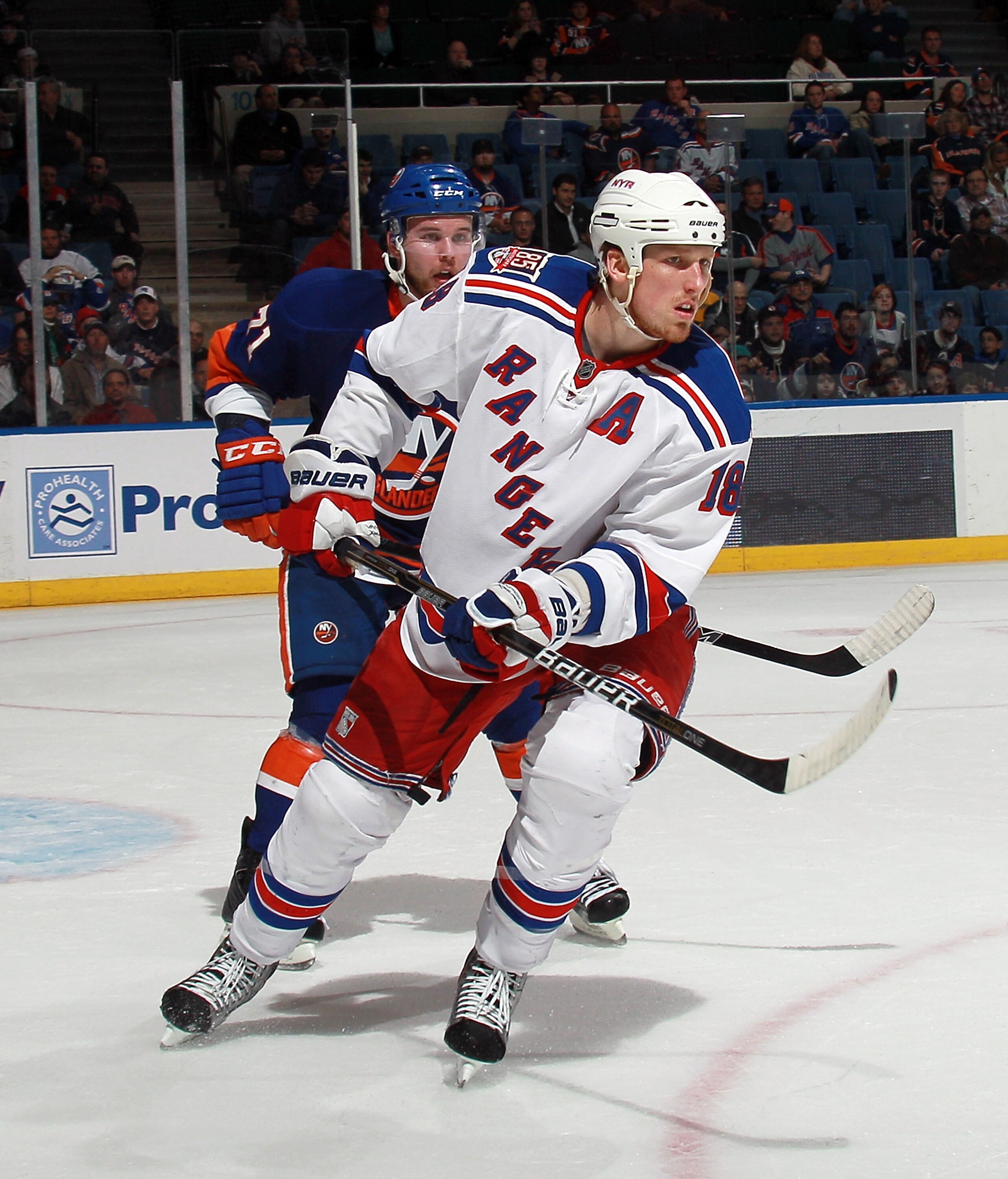 UNIONDALE, NY - MARCH 31: Marc Staal #18 of the New York Rangers skates against the New York Islanders at the Nassau Coliseum on March 31, 2011 in Uniondale, New York. (Photo by Bruce Bennett/Getty Images) UNIONDALE, NY - MARCH 31: Marc Staal #18 of the New York Rangers skates against the New York Islanders at the Nassau Coliseum on March 31, 2011 in Uniondale, New York. (Photo by Bruce Bennett/Getty Images)