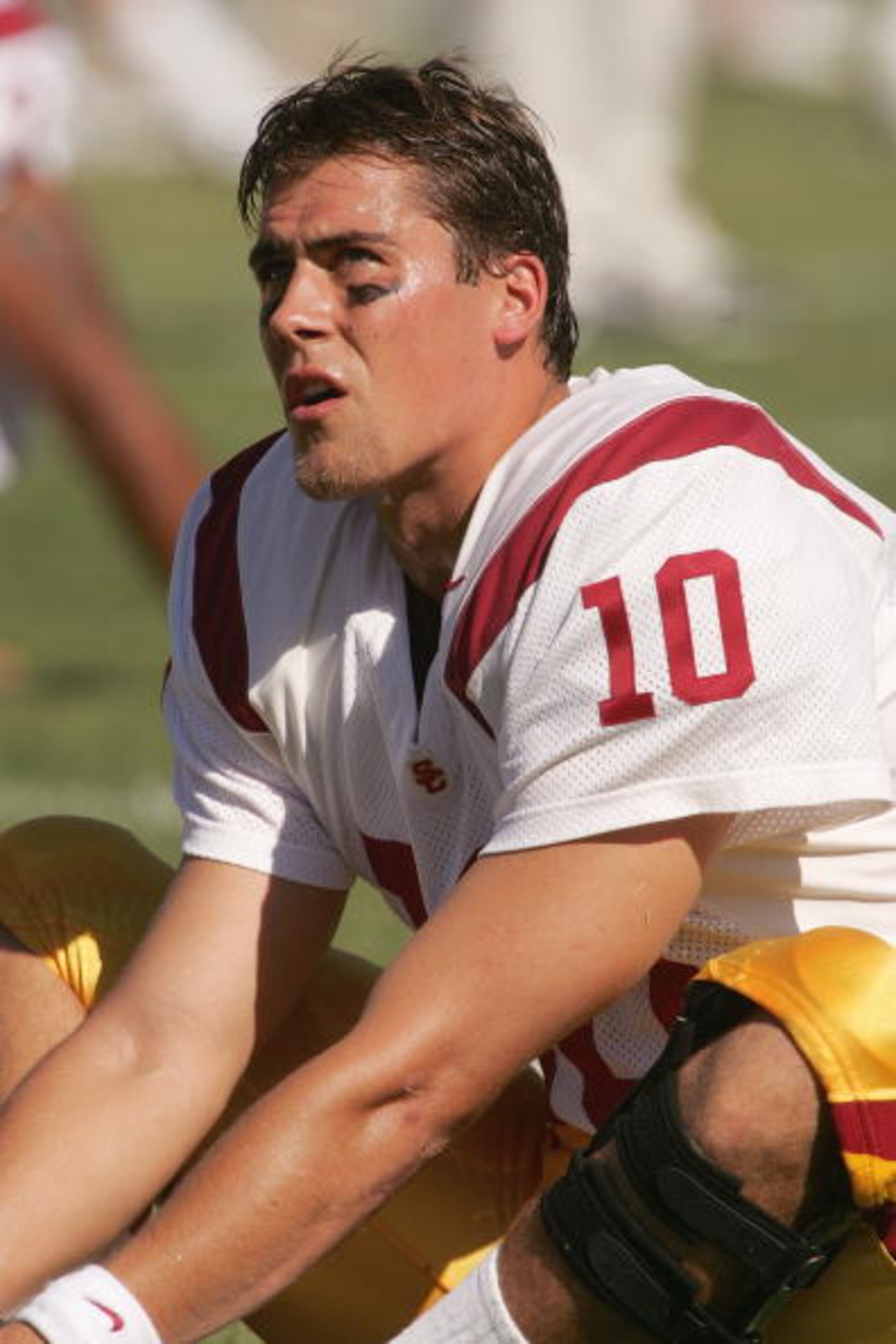 PALO ALTO, CA - SEPTEMBER 25:  Matt Cassel #10 of the USC Trojans stretches prior to the game against the Stanford Cardinal on September 25, 2004 at Stanford Stadium in Palo Alto, California.  USC defeated Stanford 31-28. (Photo by Stephen Dunn/Getty Imag