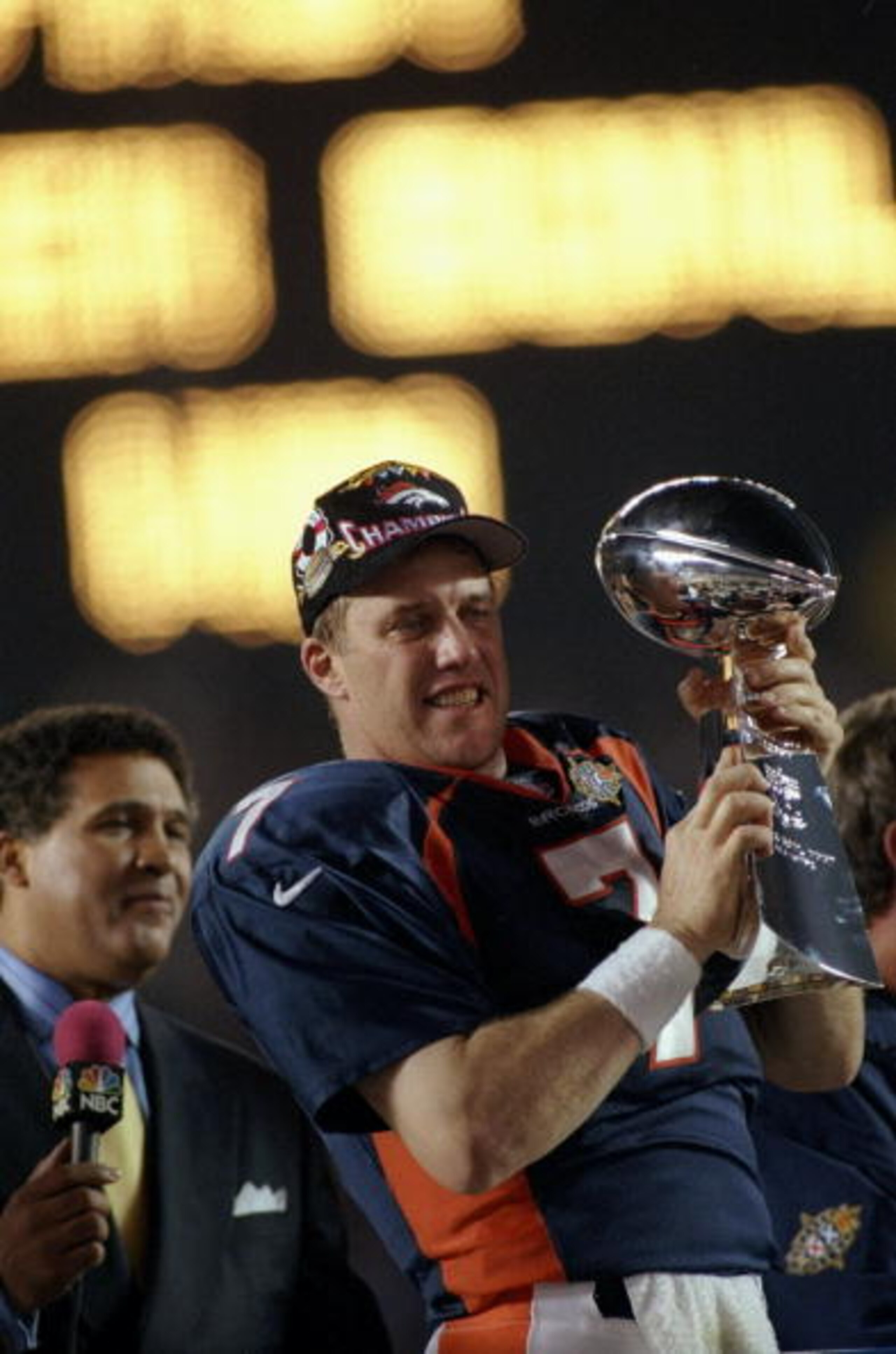 25 Jan 1998:  John Elway #7 of the Denver Broncos holds the Lombardi Trophy after defeating the Green Bay Packers in Super Bowl  XXXII at Qualcomm Stadium in San Diego, California.  The Denver Broncos defeated the Green Bay Packers 31-24. Mandatory Credit