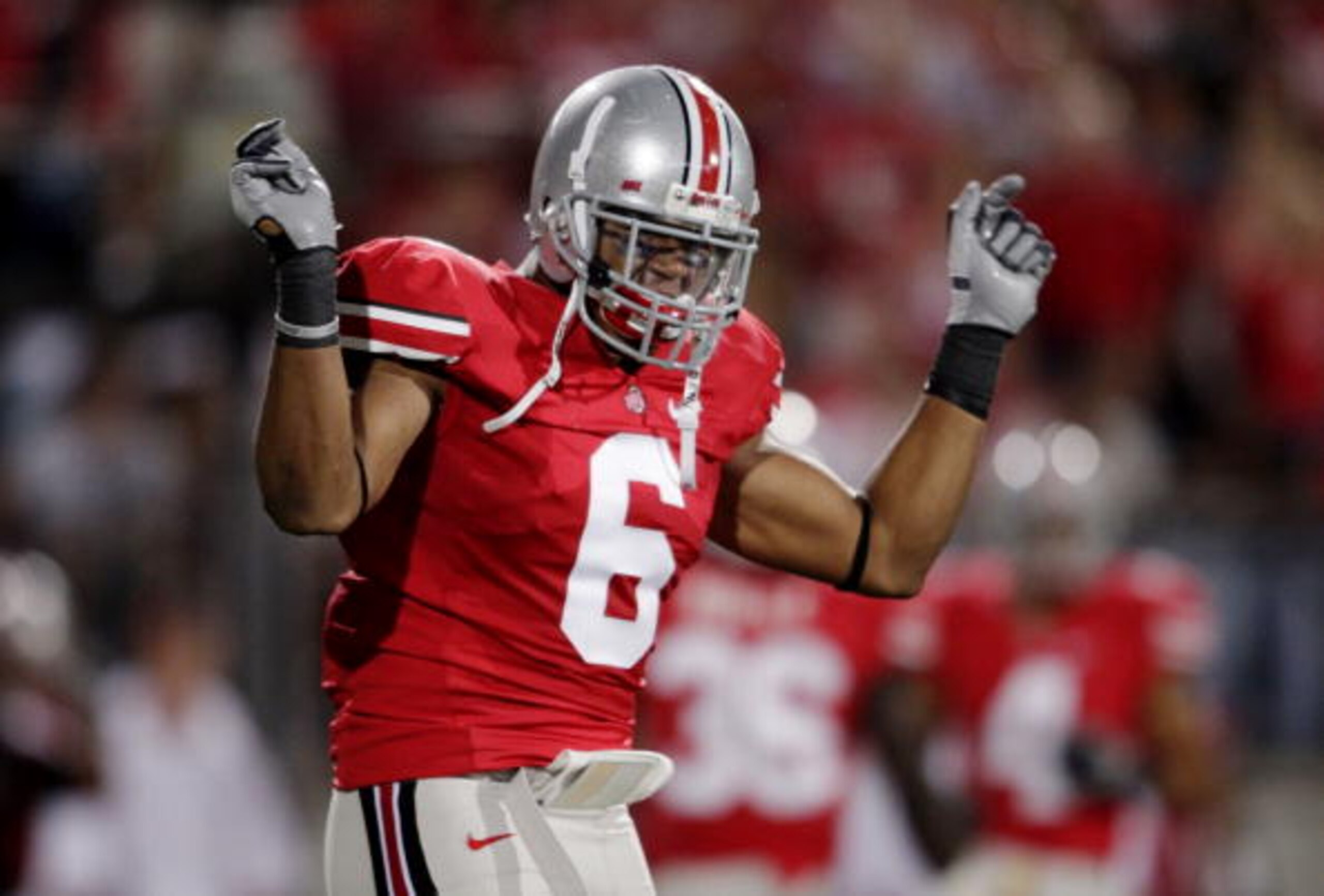COLUMBUS, OH - SEPTEMBER 12: Linebacker Etienne Sabino #6 of the Ohio State Buckeyes celebrates after stopping C.J. Gable #2 of the USC Trojans (not pictured) during the first quarter of the game at Ohio Stadium on September 12, 2009 in Columbus, Ohio. ( COLUMBUS, OH - SEPTEMBER 12: Linebacker Etienne Sabino #6 of the Ohio State Buckeyes celebrates after stopping C.J. Gable #2 of the USC Trojans (not pictured) during the first quarter of the game at Ohio Stadium on September 12, 2009 in Columbus, Ohio. (