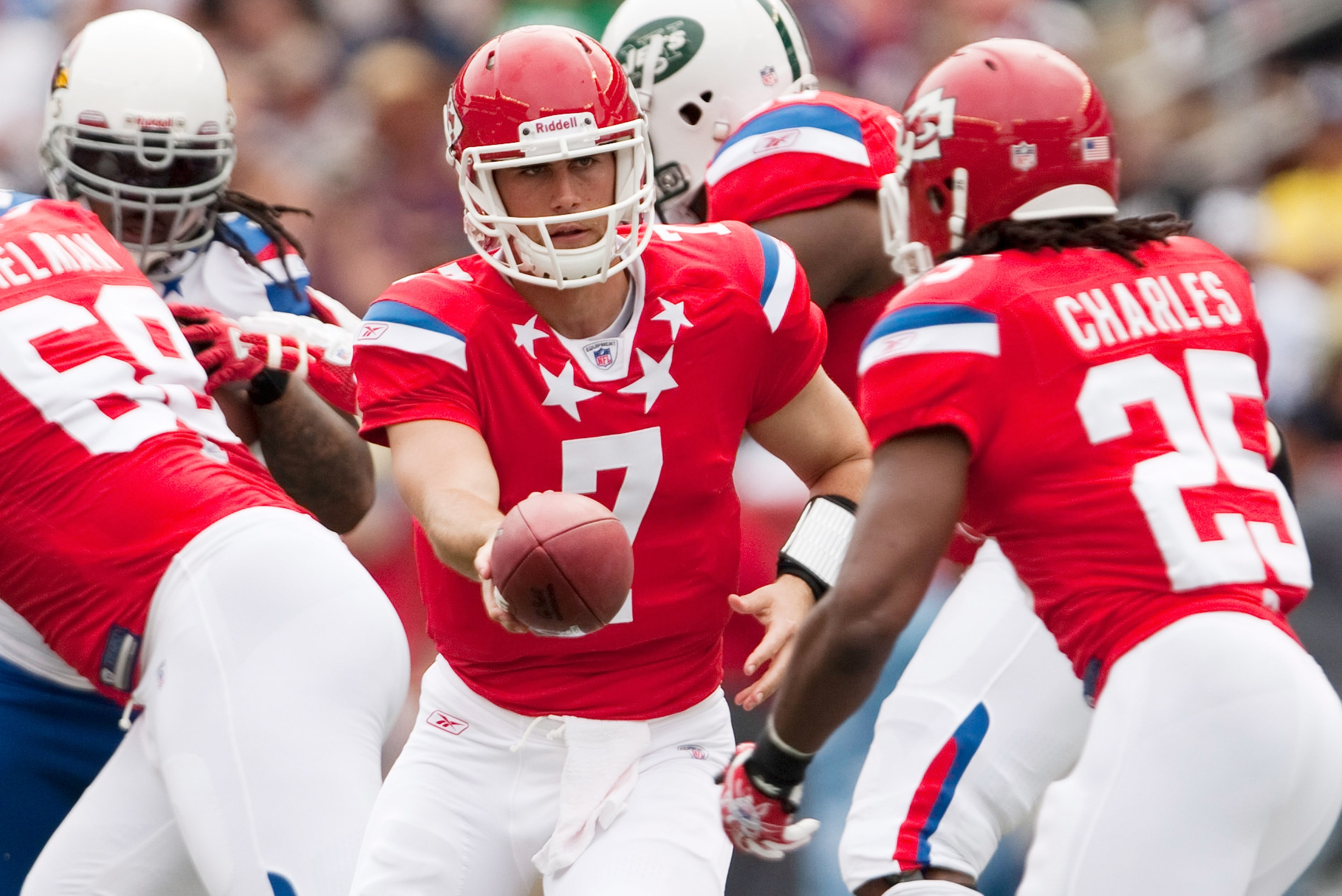 HONOLULU - JANUARY 30: Matt Cassel #7 of the Kansas City Chiefs hands the ball off to Jamaal Charles #25 of the Kansas City Chiefs during the 2011 NFL Pro Bowl against the National Football Conference (NFC) at Aloha Stadium on January 30, 2011 in Honolulu