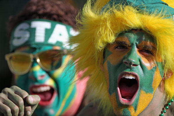 DENVER - SEPTEMBER 04:  Student fans of the Colorado State Rams cheer on their team as they prepare to face the Colorado Buffaloes in the Rocky Mountain Showdown at INVESCO Field at Mile High on September 4, 2010 in Denver, Colorado.  (Photo by Doug Pensi