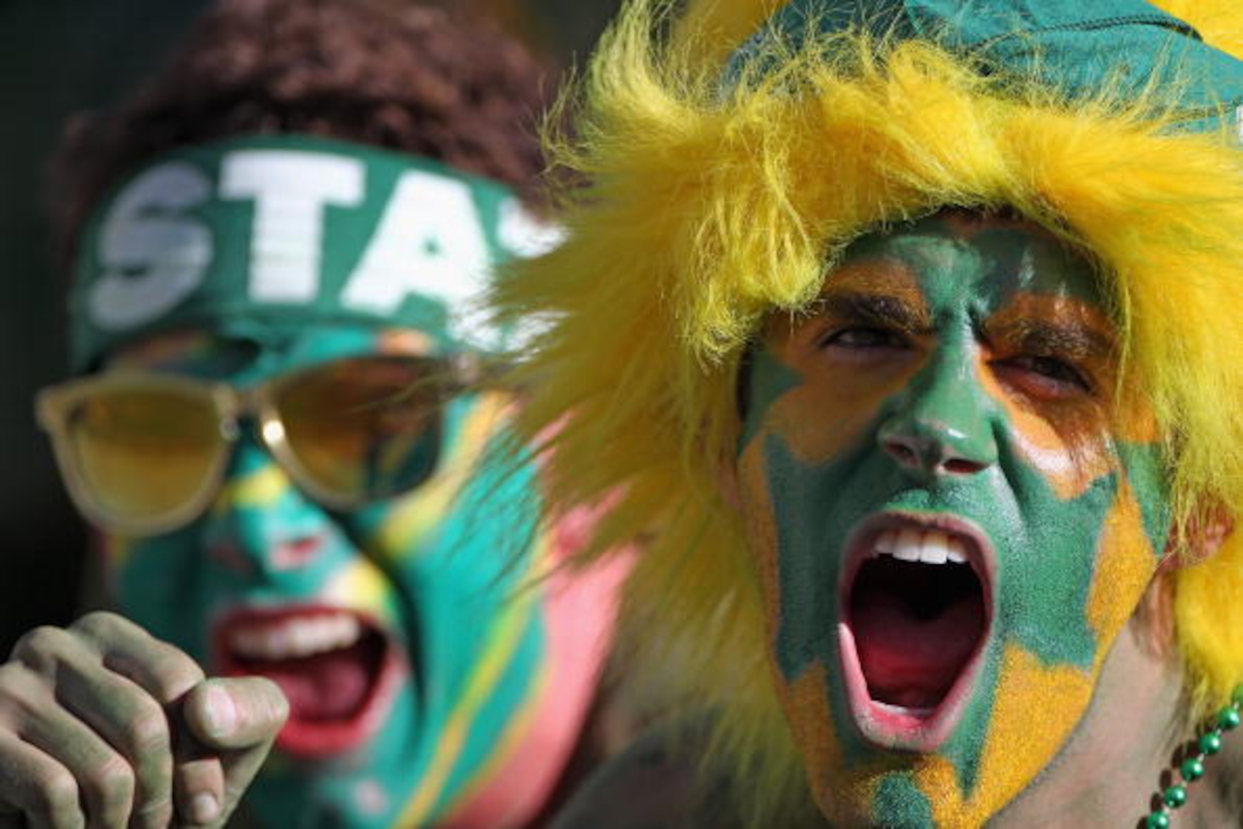 DENVER - SEPTEMBER 04:  Student fans of the Colorado State Rams cheer on their team as they prepare to face the Colorado Buffaloes in the Rocky Mountain Showdown at INVESCO Field at Mile High on September 4, 2010 in Denver, Colorado.  (Photo by Doug Pensi