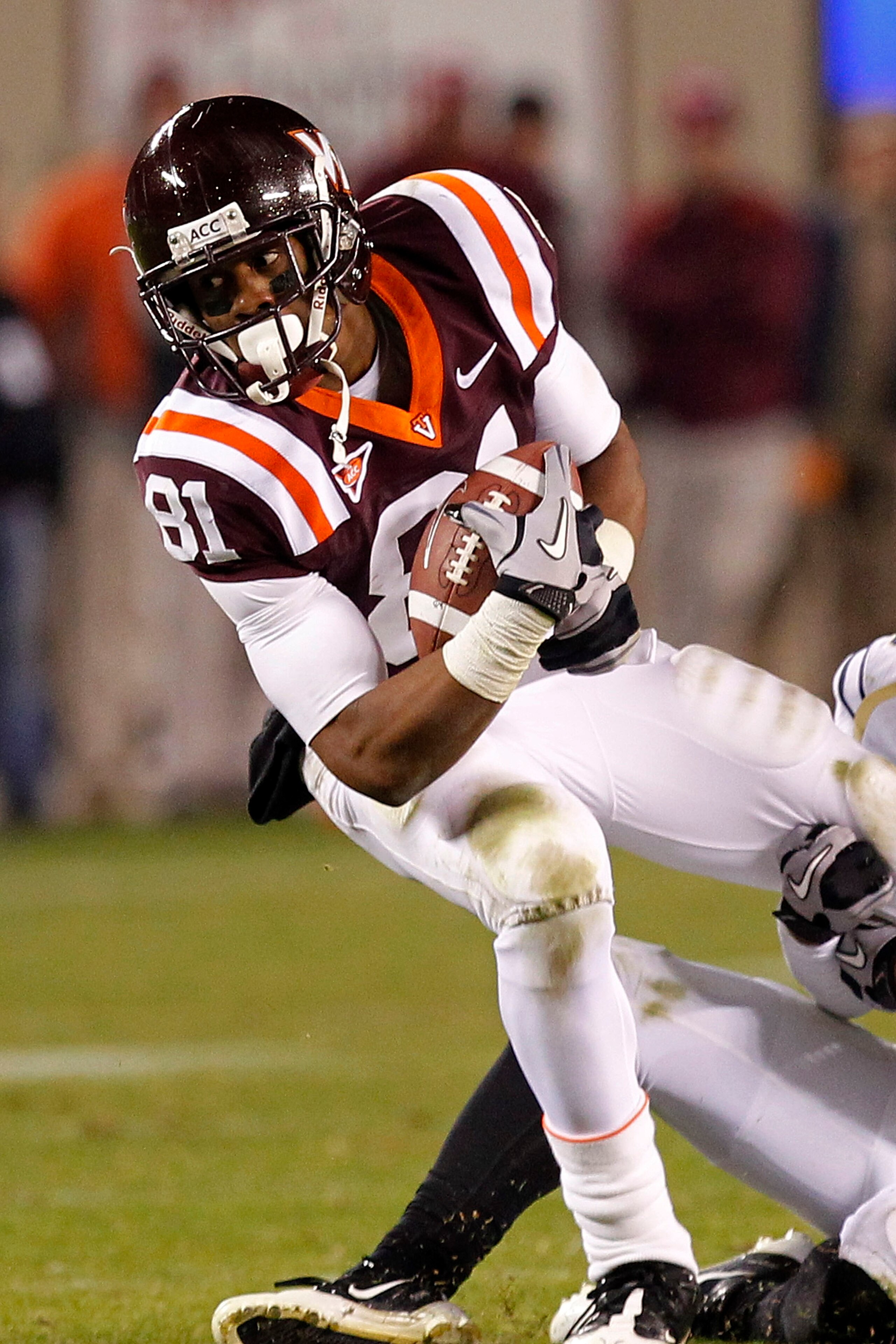 BLACKSBURG, VA - NOVEMBER 04: Wide receiver Jarrett Boykin #81 of the Virginia Tech Hokies is tackled while running with the ball against the Georgia Tech Yellow Jackets at Lane Stadium on November 4, 2010 in Blacksburg, Virginia.  (Photo by Geoff Burke/G