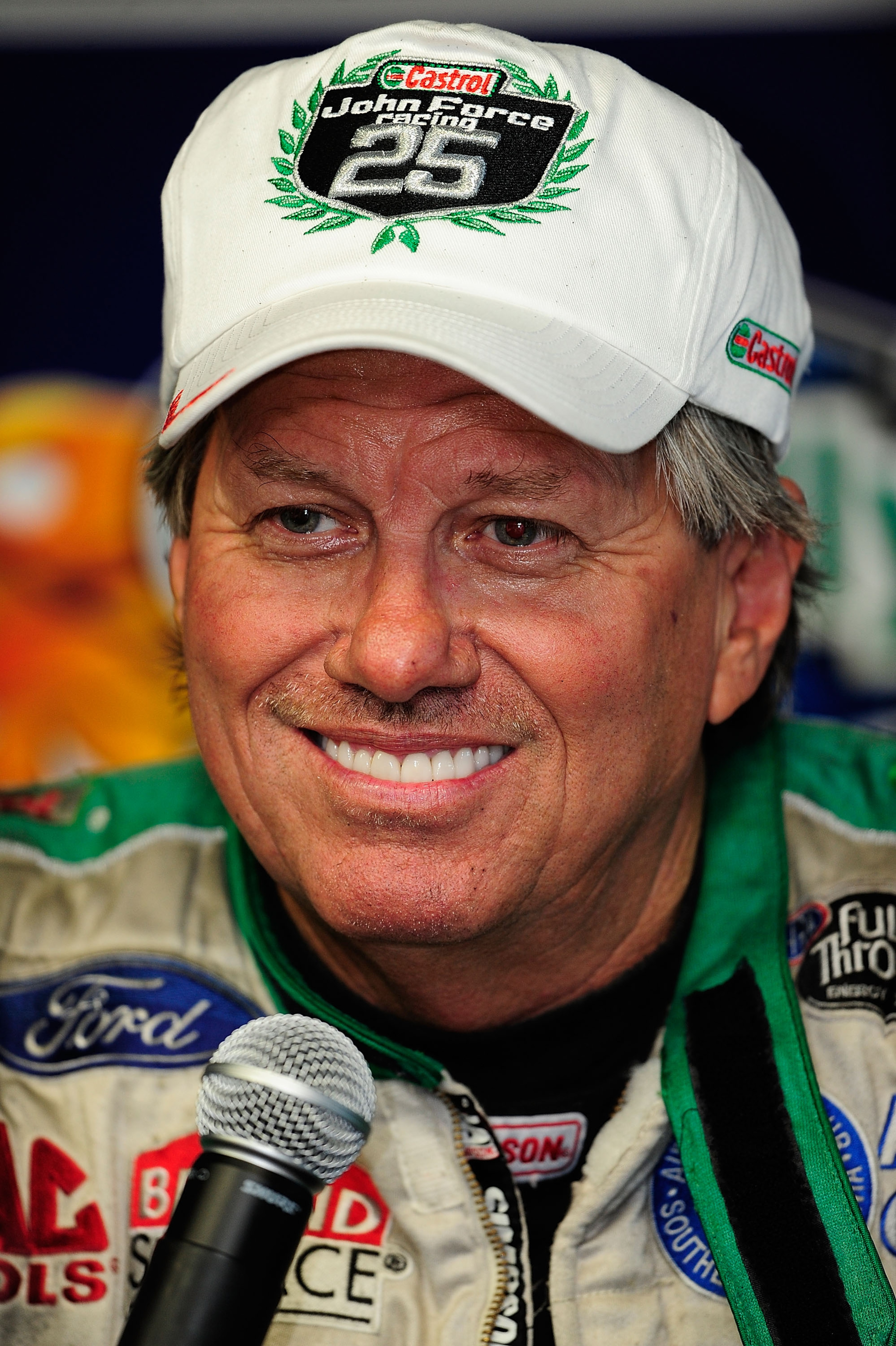 CONCORD, NC - SEPTEMBER 17:  NHRA Funny Car points leader John Force speaks with the media at zMax Dragway on September 17, 2010 in Concord, North Carolina.  (Photo by Rusty Jarrett/Getty Images)