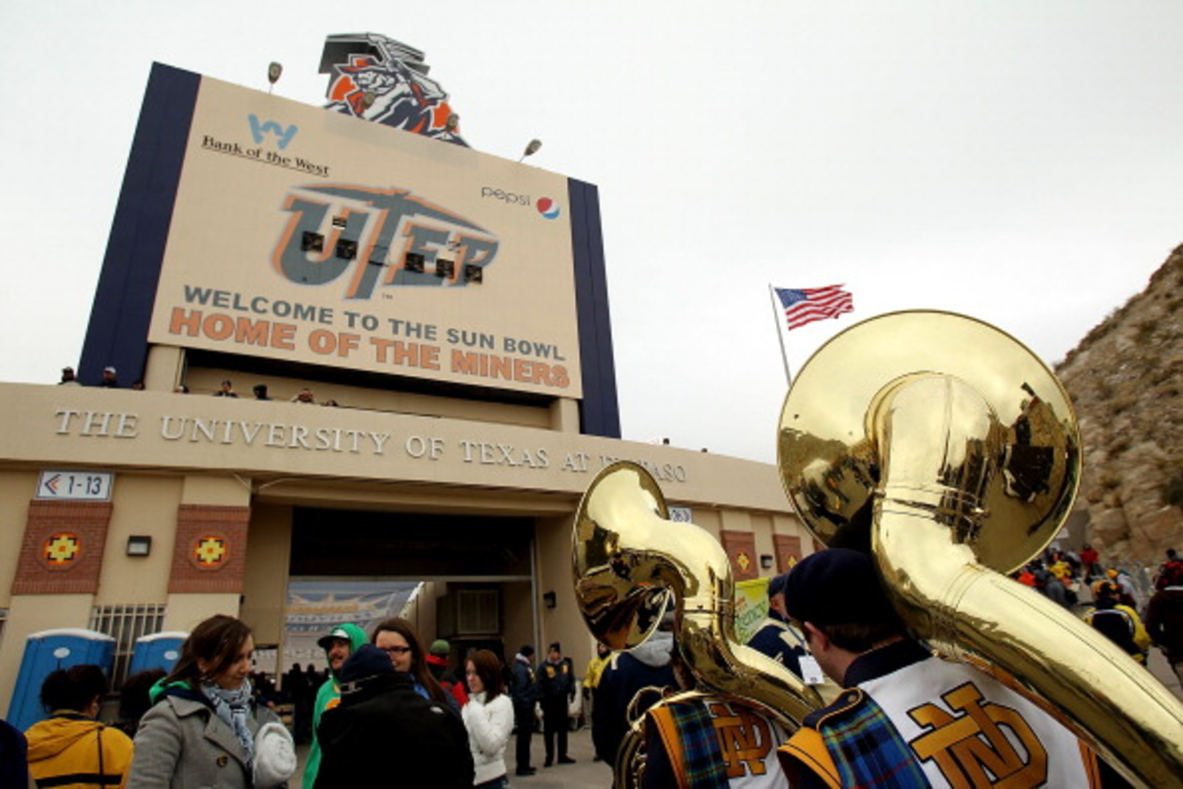 EL PASO, TX - DECEMBER 31:  Fans walk to the Sun Bowl before the Hyundai Sun Bowl game between the Notre Dame Fighting Irish and Miami Hurricanes on December 31, 2010 in El Paso, Texas.  (Photo by Ronald Martinez/Getty Images)