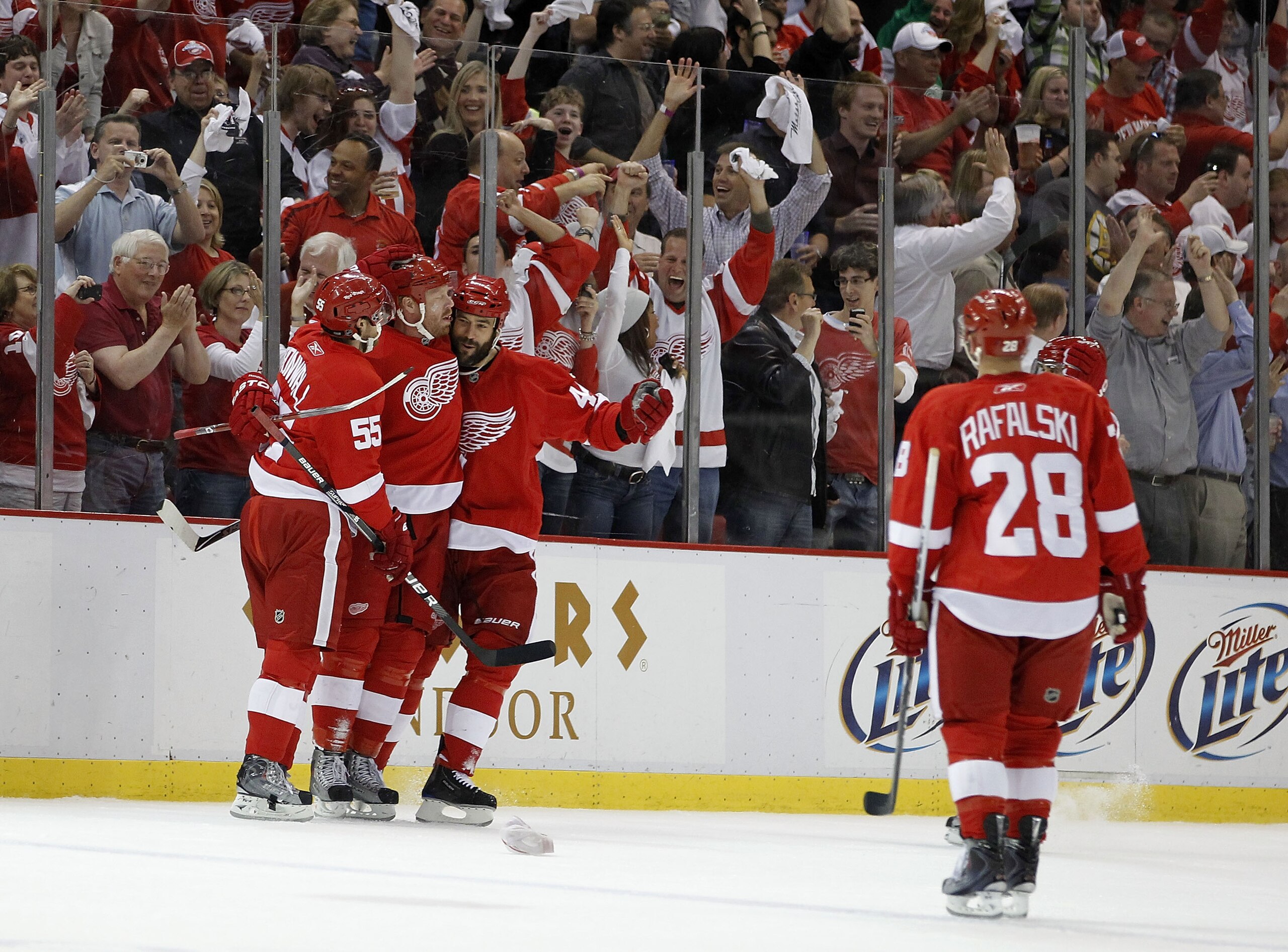 DETROIT - MAY 06: Johan Franzen #93 of the Detroit Red Wings celebrates his third goal of the first period with Niklas Kronwall #55, Todd Bertuzzi #44 and Brian Rafalski #28 while playing the San Jose Sharks in Game Four of the Western Conference Semifina