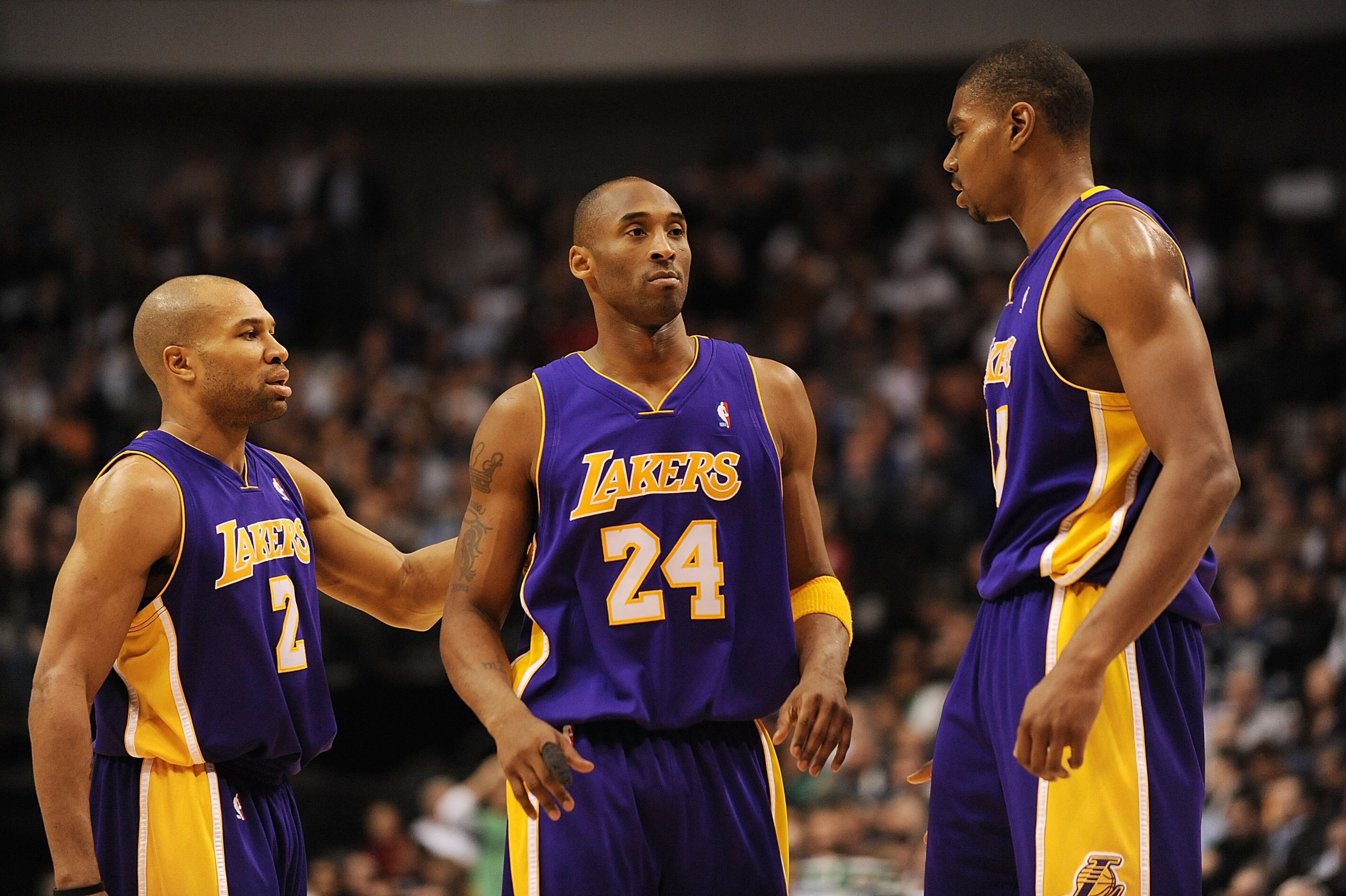 DALLAS - JANUARY 13: Derek Fisher #1, Kobe Bryant #24 and Andrew Bynum #17 of the Los Angeles Lakers on January 13, 2010 at American Airlines Center in Dallas, Texas. NOTE TO USER: User expressly acknowledges and agrees that, by downloading and/or using DALLAS - JANUARY 13: Derek Fisher #1, Kobe Bryant #24 and Andrew Bynum #17 of the Los Angeles Lakers on January 13, 2010 at American Airlines Center in Dallas, Texas. NOTE TO USER: User expressly acknowledges and agrees that, by downloading and/or using