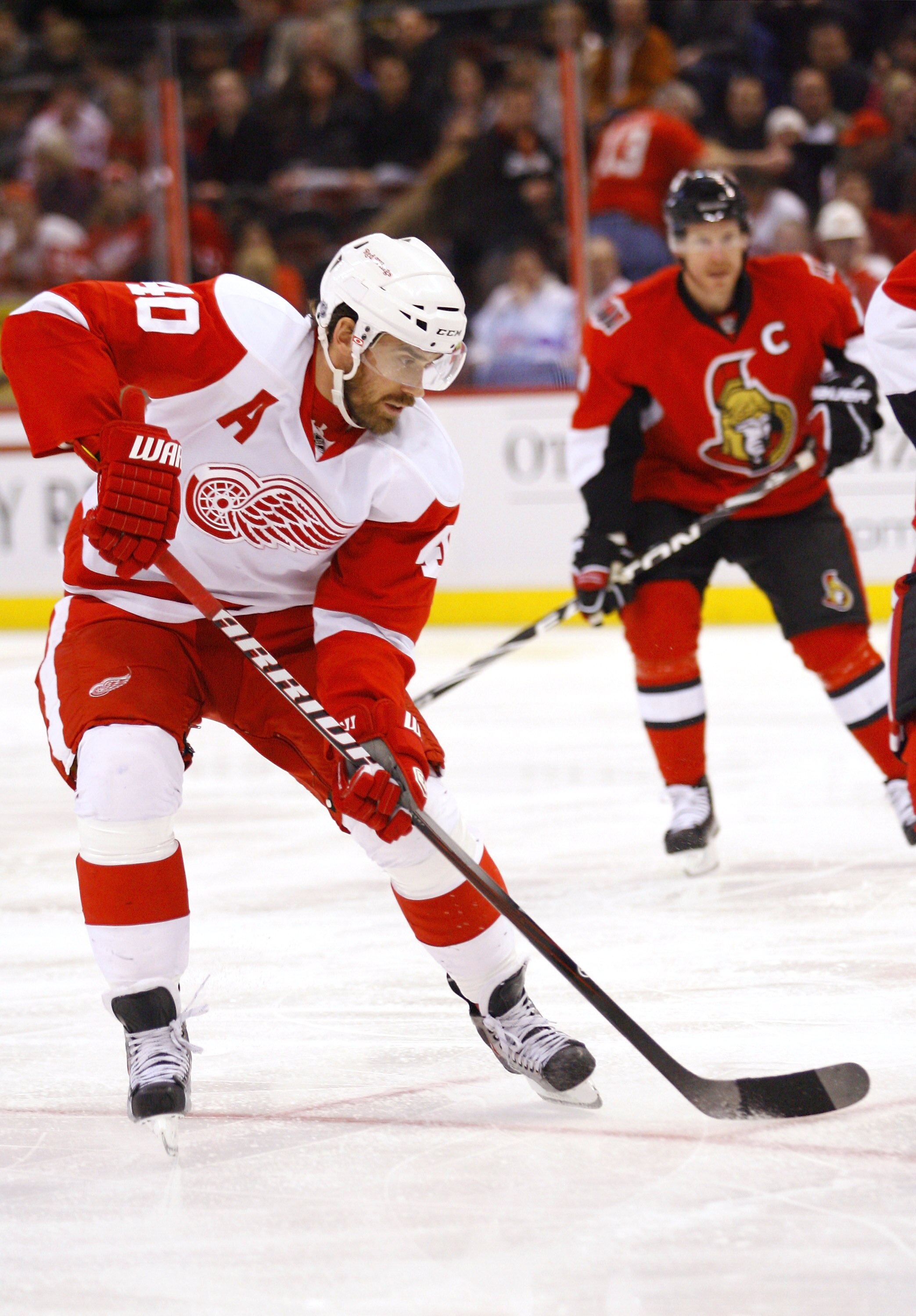 OTTAWA, CANADA - FEBRUARY 02:  Henrik Zetterberg #40 of the Detroit Red Wings skates hard towards the net looking for a loose puck in a game against the Ottawa Senators at Scotiabank Place on February 2, 2011 in Ottawa, Ontario, Canada.  (Photo by Phillip