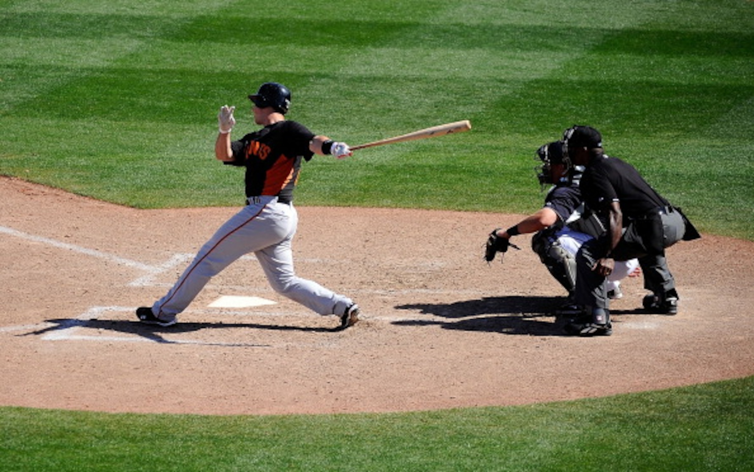 PEORIA, AZ - MARCH 08: Buster Posey #28 of the San Francisco Giants at bat against the Seattle Mariners during the spring training baseball game against at Peoria Stadium on March 8, 2011 in Peoria, Arizona. (Photo by Kevork Djansezian/Getty Images) PEORIA, AZ - MARCH 08: Buster Posey #28 of the San Francisco Giants at bat against the Seattle Mariners during the spring training baseball game against at Peoria Stadium on March 8, 2011 in Peoria, Arizona. (Photo by Kevork Djansezian/Getty Images)