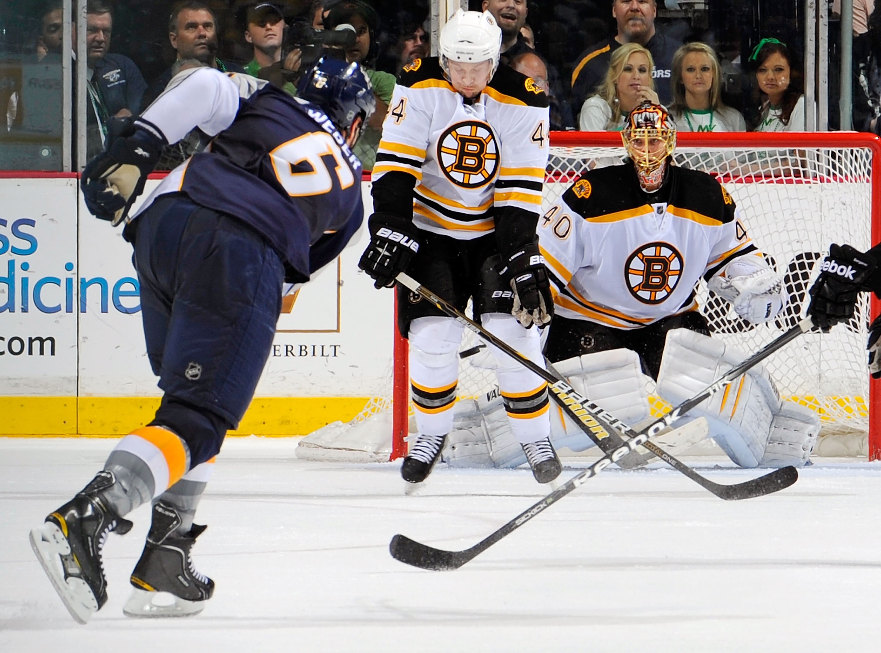 NASHVILLE, TN - MARCH 17: Dennis Seidenberg #44 of the Boston Bruins blocks a shot by Shea Weber #6 of the Nashville Predators in front of Bruin goalie Tuuku Rask #40  on March 17, 2011 at the Bridgestone Arena in Nashville, Tennessee.  (Photo by Frederic