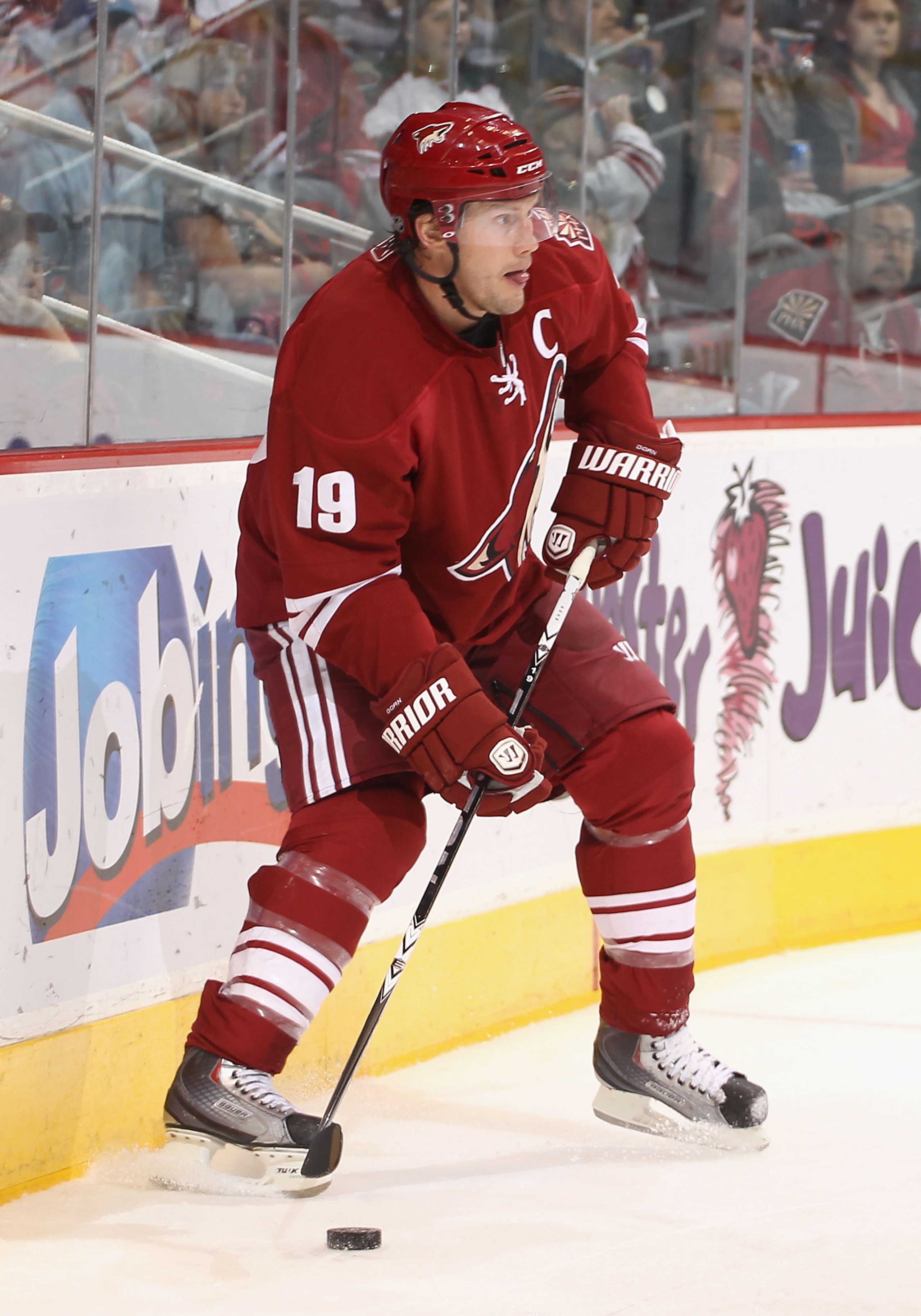 GLENDALE, AZ - APRIL 01: Shane Doan #19 of the Phoenix Coyotes skates with the puck during the NHL game against he Colorado Avalanche at Jobing.com Arena on April 1, 2011 in Glendale, Arizona. The Avalanche defeated the Coyotes 4-3 in an overtime shoot GLENDALE, AZ - APRIL 01: Shane Doan #19 of the Phoenix Coyotes skates with the puck during the NHL game against he Colorado Avalanche at Jobing.com Arena on April 1, 2011 in Glendale, Arizona. The Avalanche defeated the Coyotes 4-3 in an overtime shoot