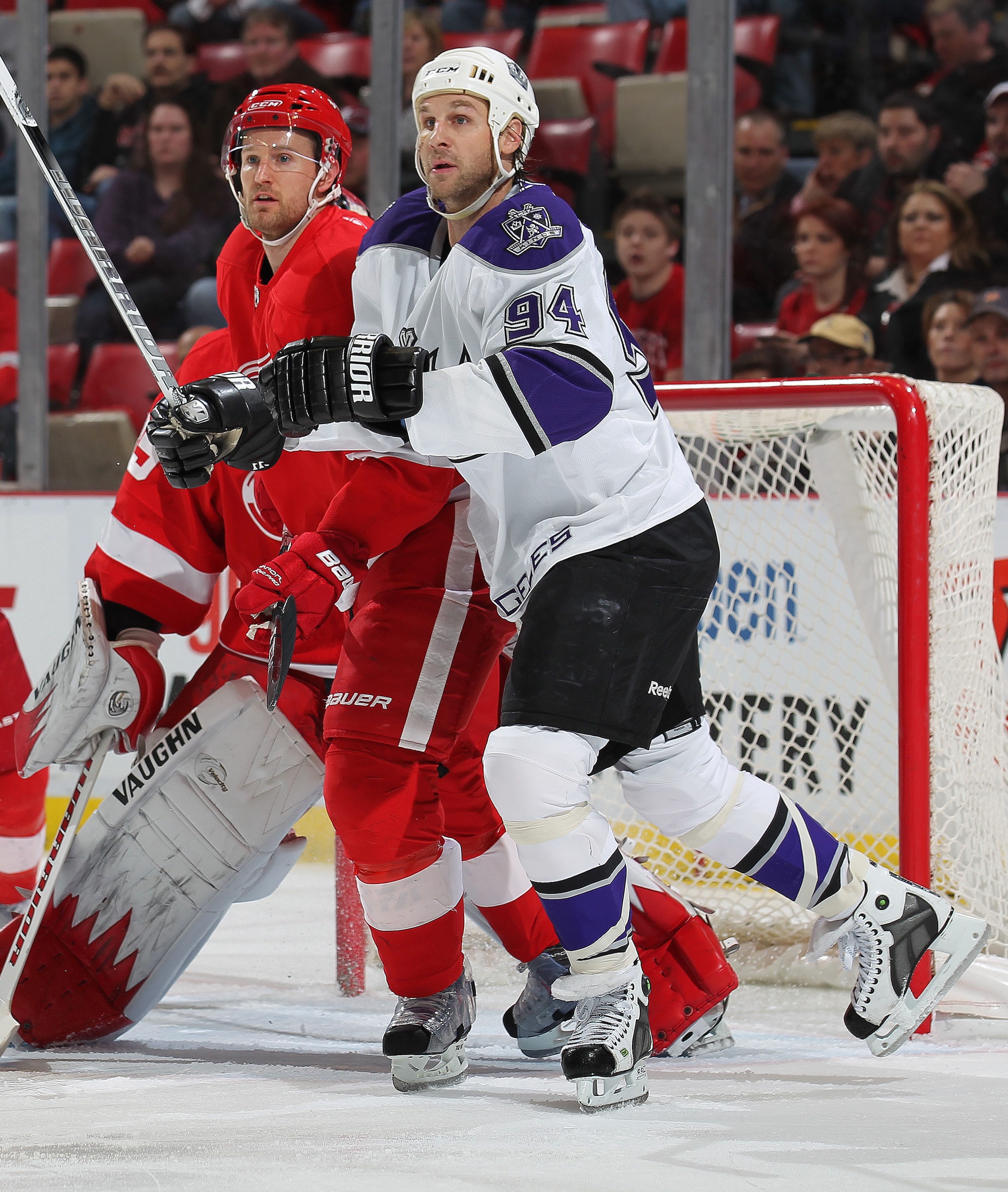 DETROIT, MI - MARCH 9:  Ryan Smyth #94 of the Los Angeles Kings looks to deflect a shot next to Niklas Kronwall #55 of the Detroit Red Wings in a game on March 9, 2011 at the Joe Louis Arena in Detroit, Michigan. (Photo by Claus Andersen/Getty Images)