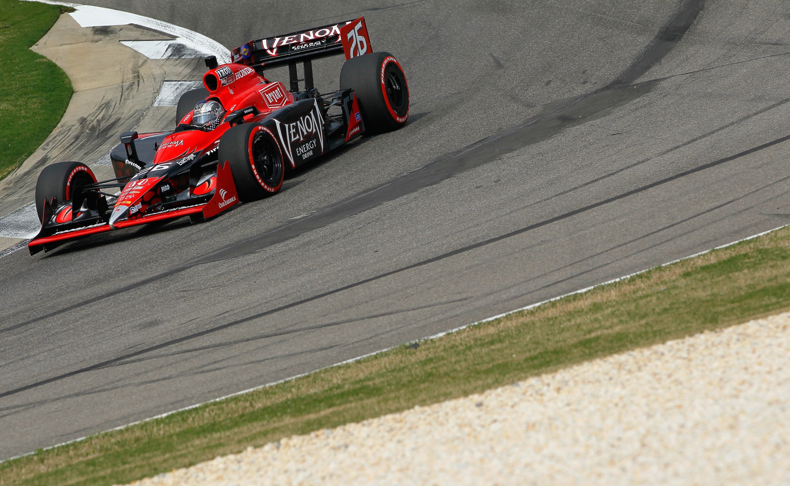 BIRMINGHAM, AL - APRIL 09: Marco Andretti, driver of the #26 Andretti Autosport Dallara Honda, drives during qualifying for the IndyCar Series Honda Indy Grand Prix of Alabama at Barber Motorsports Park on April 9, 2011 in Birmingham, Alabama. (Photo by BIRMINGHAM, AL - APRIL 09: Marco Andretti, driver of the #26 Andretti Autosport Dallara Honda, drives during qualifying for the IndyCar Series Honda Indy Grand Prix of Alabama at Barber Motorsports Park on April 9, 2011 in Birmingham, Alabama. (Photo by
