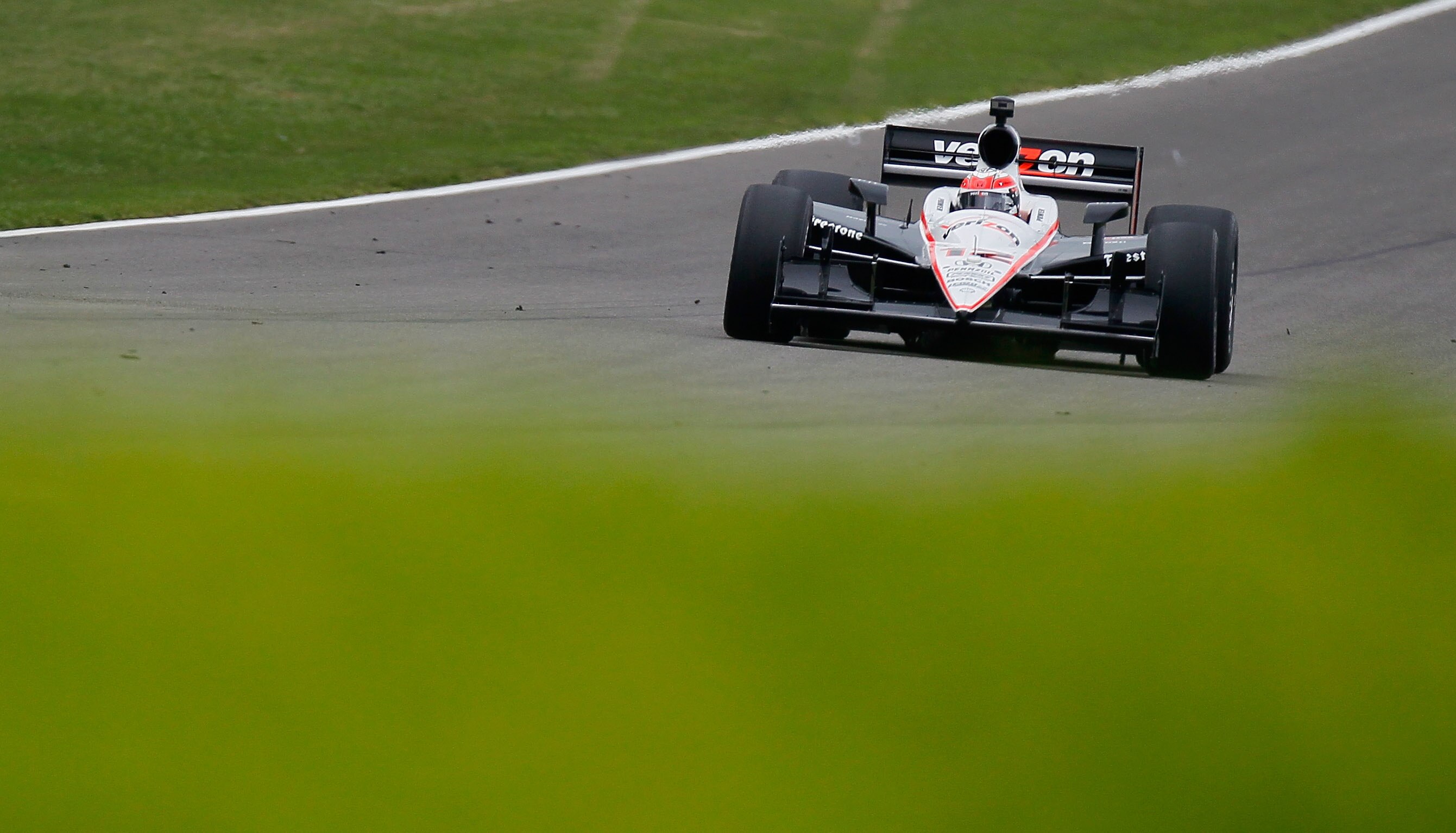 BIRMINGHAM, AL - APRIL 10:  Will Power of Australia, driver of the #12 Team Penske Dallara Honda, drives during warmups before the IndyCar Series Honda Indy Grand Prix of Alabama at Barber Motorsports Park on April 10, 2011 in Birmingham, Alabama.  (Photo