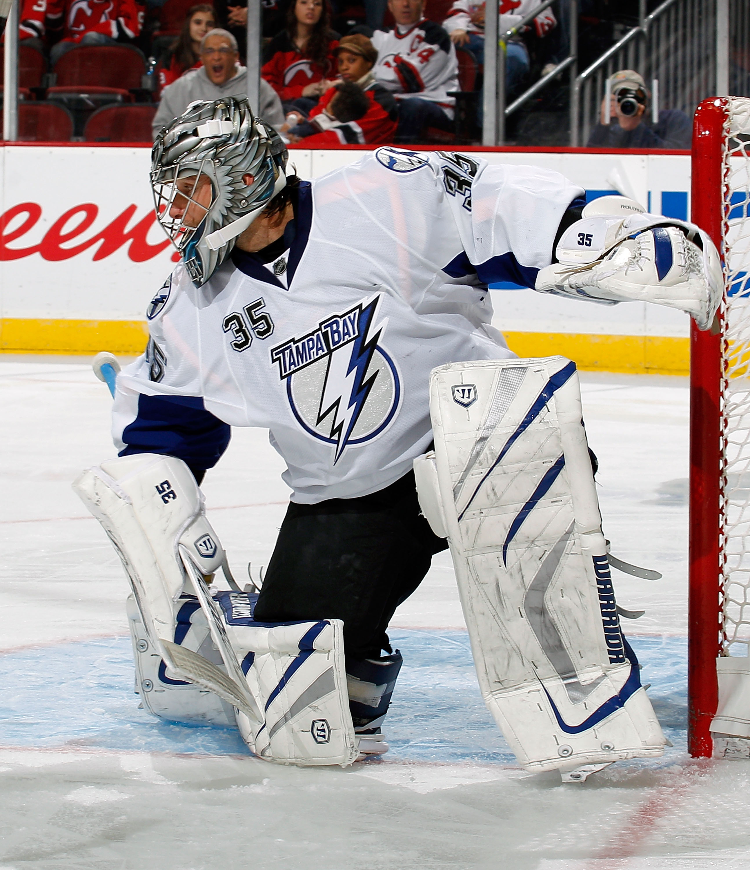 NEWARK, NJ - MARCH 02:  Goalie Dwayne Roloson #35 of the Tampa Bay Lightning protects the goal during an NHL hockey game against the New Jersey Devils at the Prudential Center on March 2, 2011 in Newark, New Jersey.  (Photo by Paul Bereswill/Getty Images)