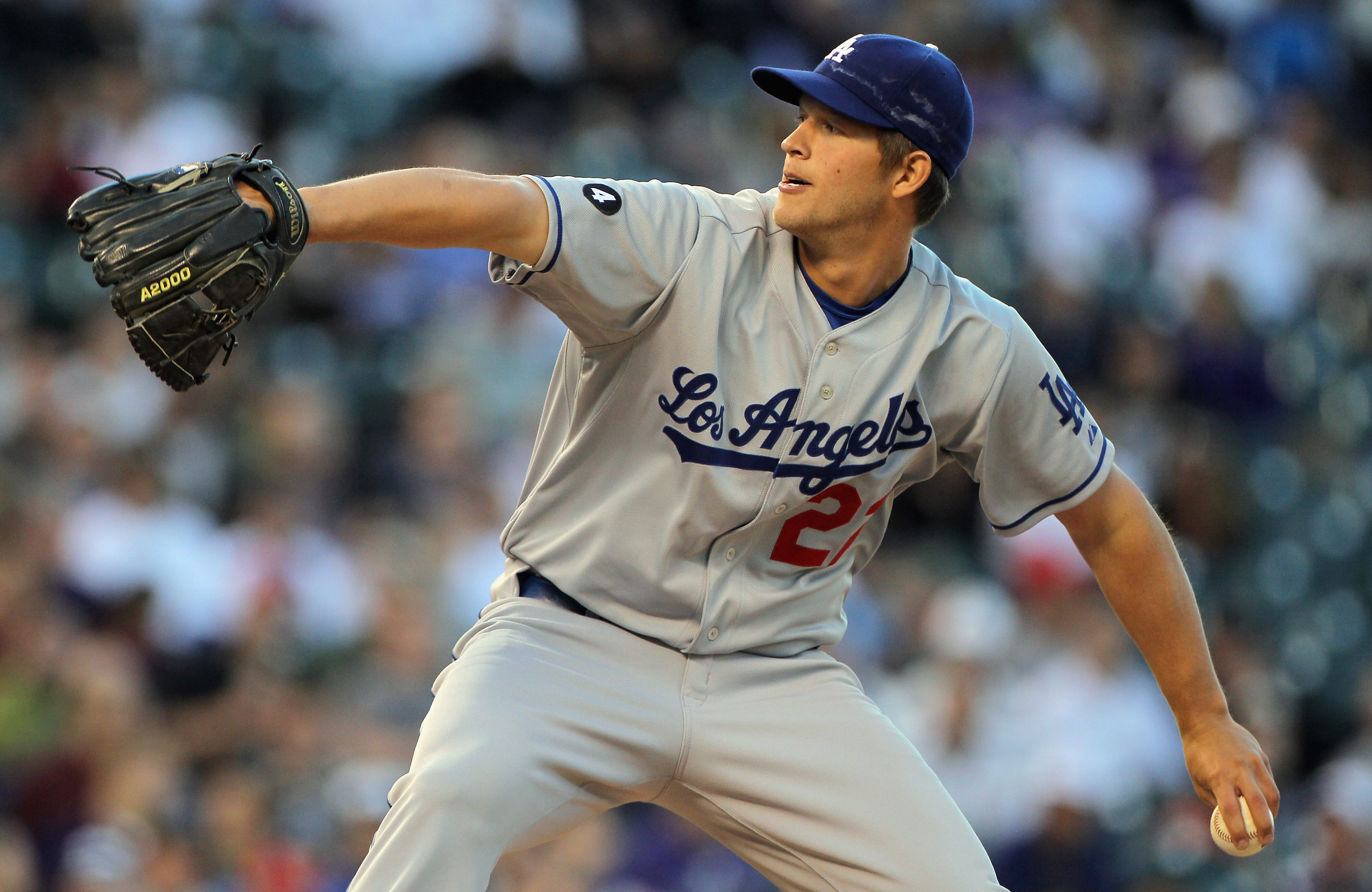DENVER, CO - APRIL 05:  Starting pitcher Clayton Kershaw #22 of the Los Angeles Dodgers delivers against the Colorado Rockies at Coors Field on April 5, 2011 in Denver, Colorado. Kershaw collected the loss as the Rockies defeated the Dodgers 3-0.  (Photo 