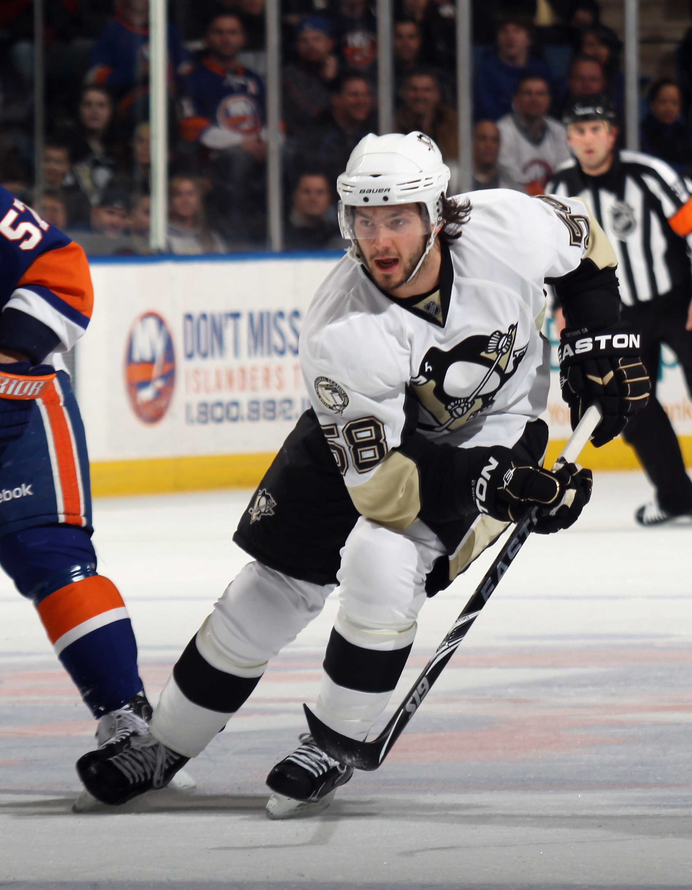 UNIONDALE, NY - APRIL 08: Kris Letang #58 of the Pittsburgh Penguins skates against the New York Islanders at the Nassau Coliseum on April 8, 2011 in Uniondale, New York.  (Photo by Bruce Bennett/Getty Images)