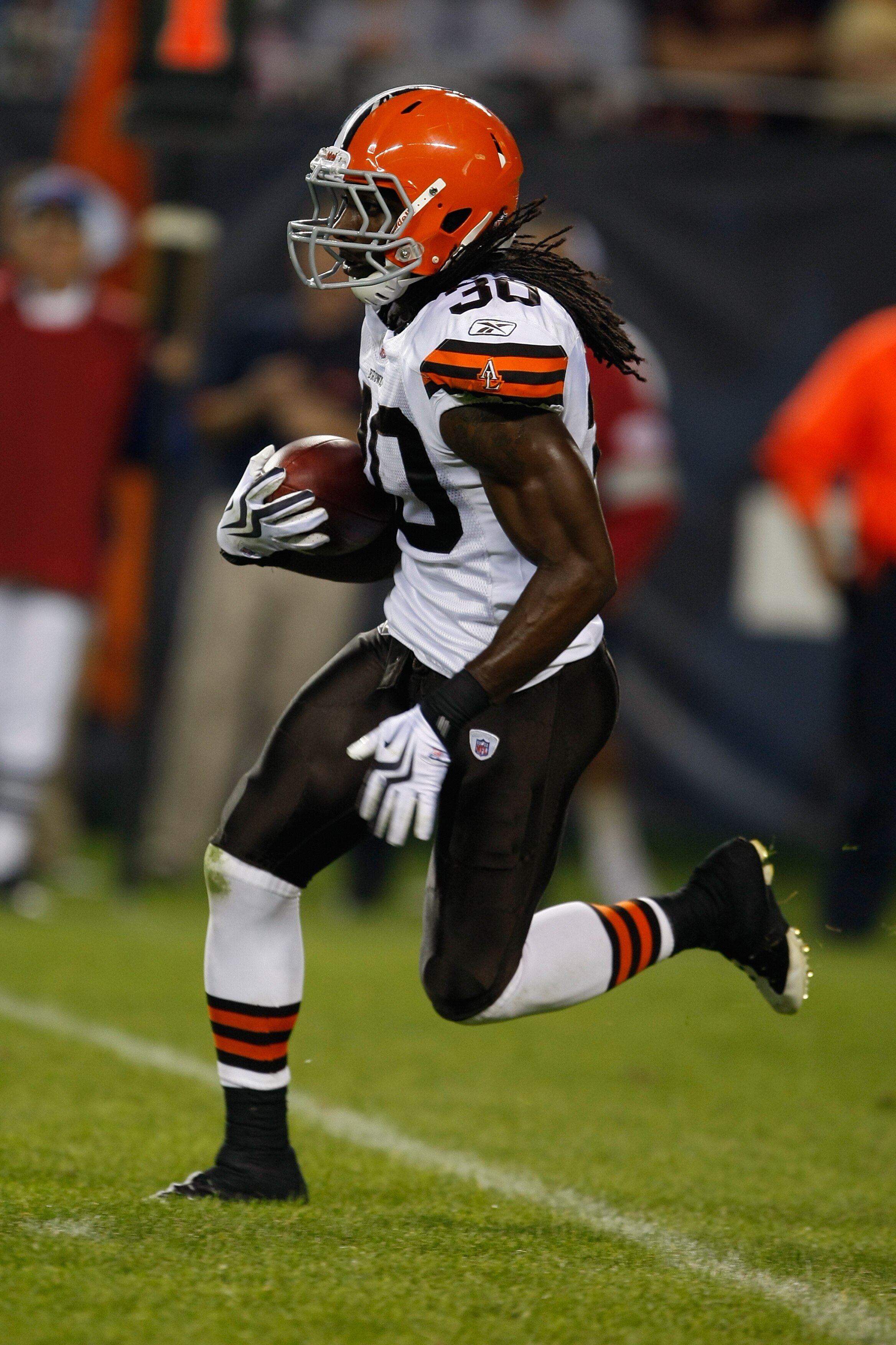 CHICAGO, IL - SEPTEMBER 3: Defensive back Gerald Lawson #30 of the Cleveland Browns runs with the football against  the Chicago Bears at Soldier Field on September 3, 2009 in Chicago, Illinois. The Bears defeated the Browns 26-23. (Photo by Scott Boehm/Ge
