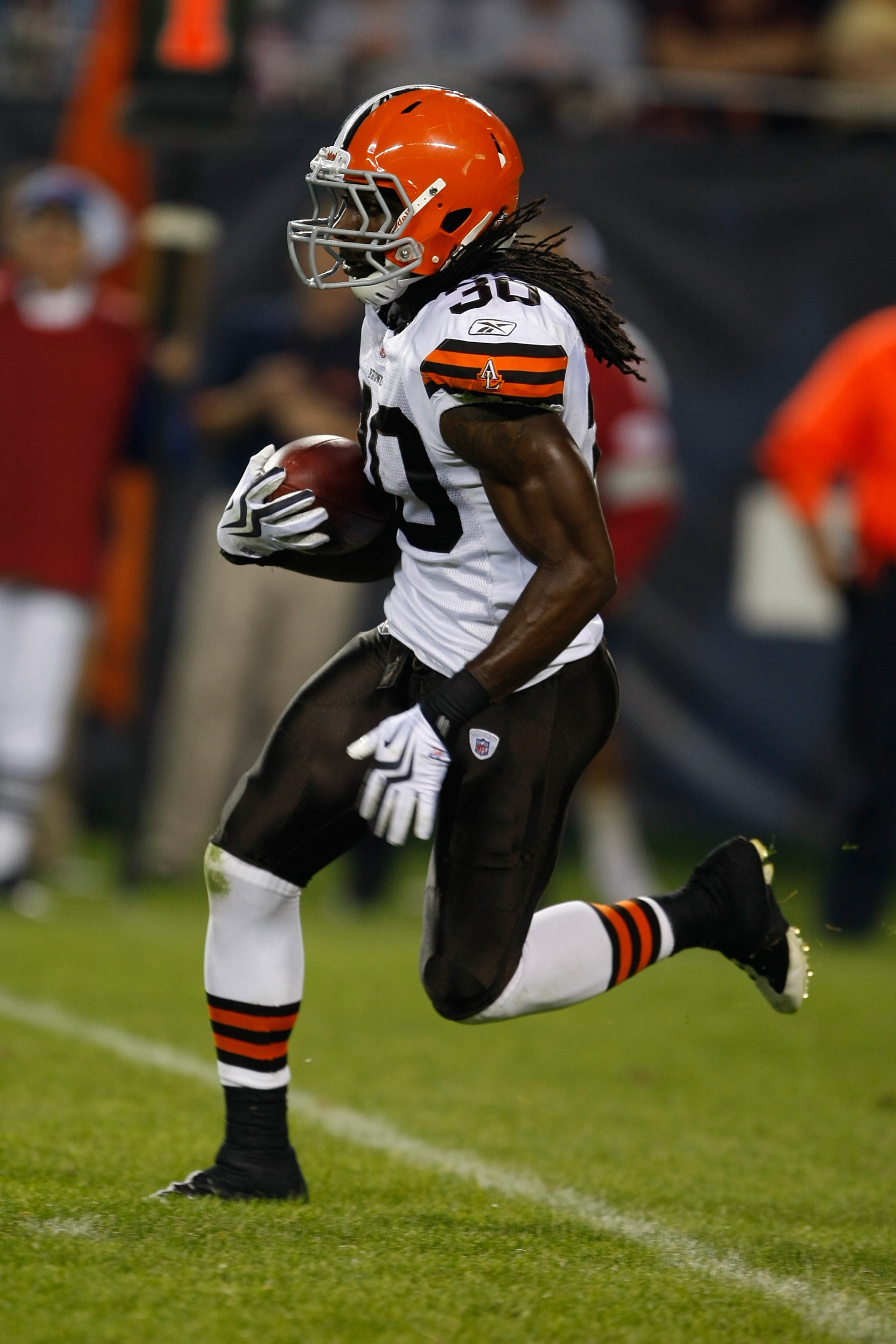 CHICAGO, IL - SEPTEMBER 3: Defensive back Gerald Lawson #30 of the Cleveland Browns runs with the football against  the Chicago Bears at Soldier Field on September 3, 2009 in Chicago, Illinois. The Bears defeated the Browns 26-23. (Photo by Scott Boehm/Ge