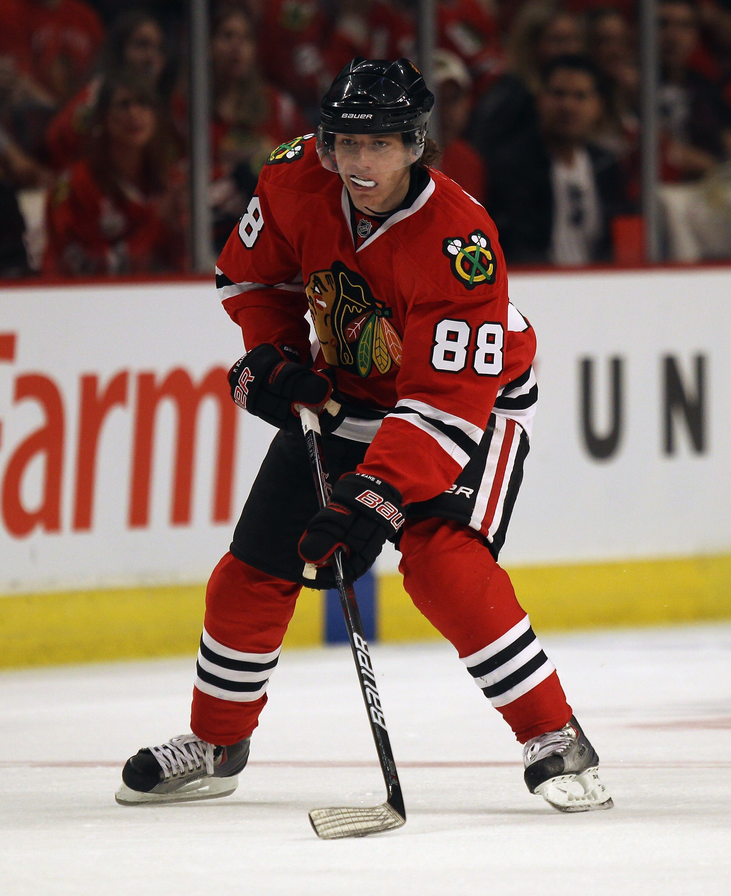 CHICAGO, IL - APRIL 10: Patrick Kane #88 of the Chicago Blackhawks controls the puck against the Detroit Red Wings at the United Center on April 10, 2011 in Chicago, Illinois. The Red Wings defeated the Blackhawks 4-3. (Photo by Jonathan Daniel/Getty Imag