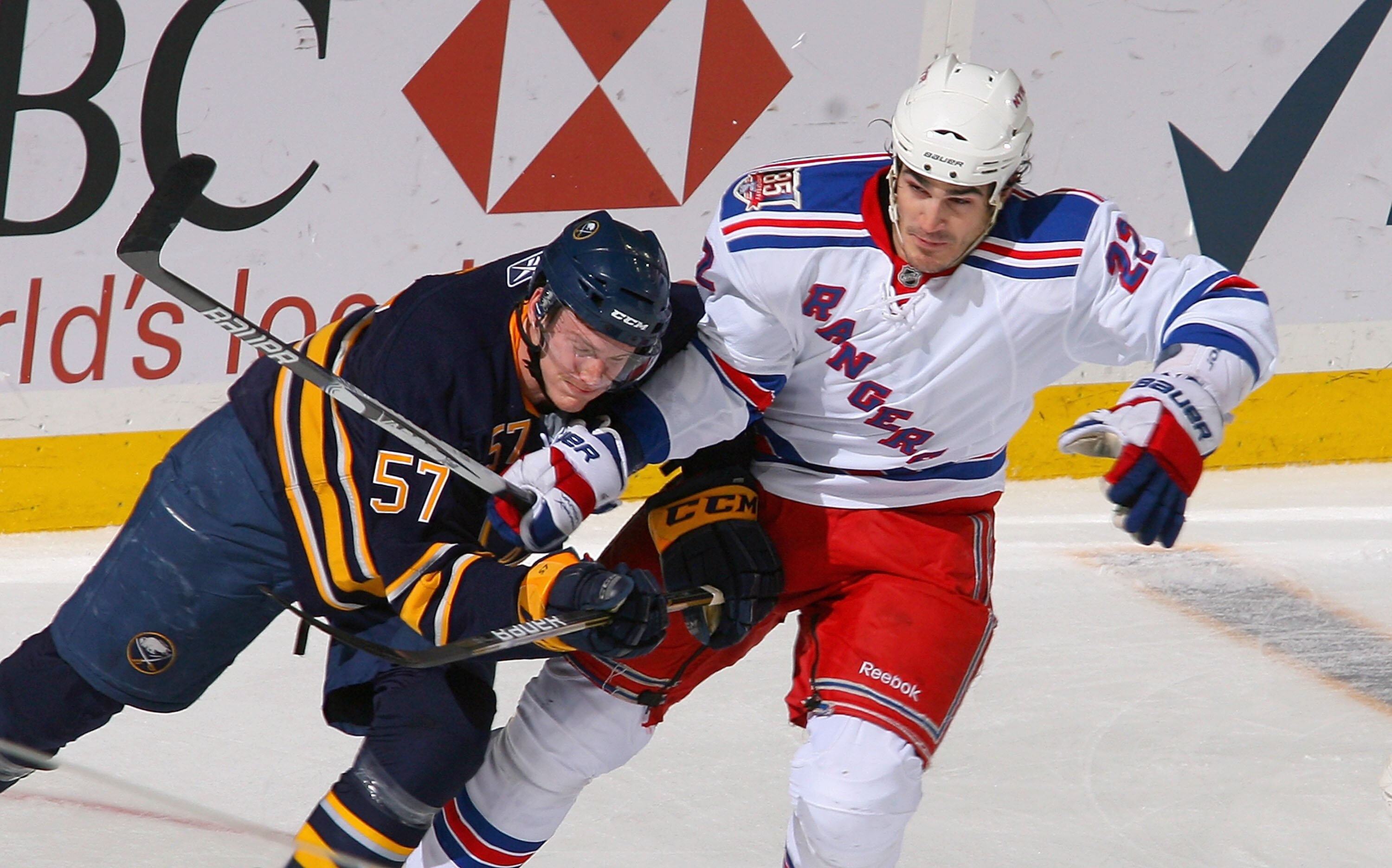 BUFFALO, NY - MARCH 30: Tyler Myers #57 of the Buffalo Sabres skates against Brian Boyle #22 of the New York Rangers at HSBC Arena on March 30, 2011 in Buffalo, New York.  (Photo by Rick Stewart/Getty Images)