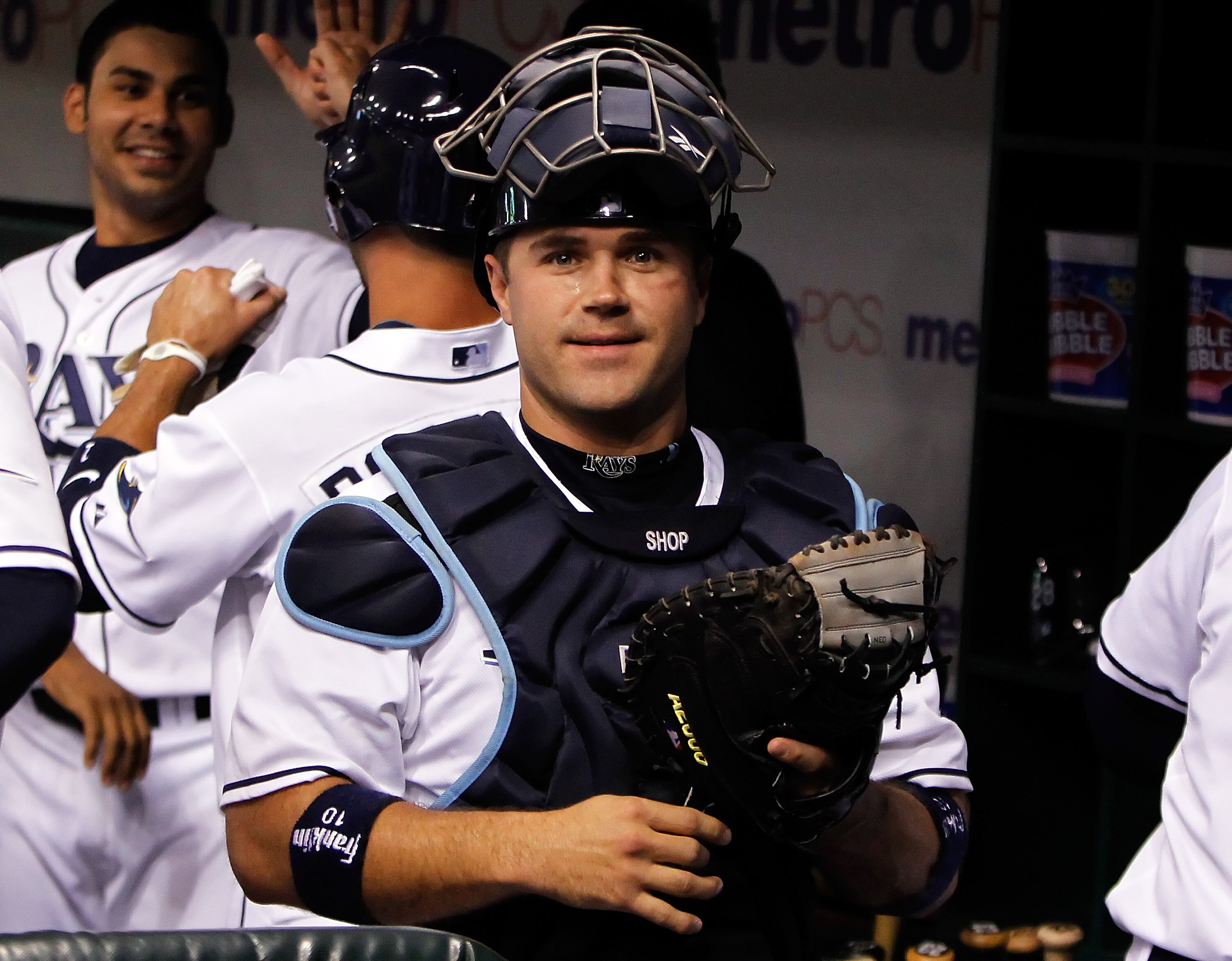 ST. PETERSBURG - AUGUST 31:  Catcher Kelly Shoppach #10 of the Tampa Bay Rays smiles as he enters the field against the Toronto Blue Jays during the game at Tropicana Field on August 31, 2010 in St. Petersburg, Florida.  (Photo by J. Meric/Getty Images)