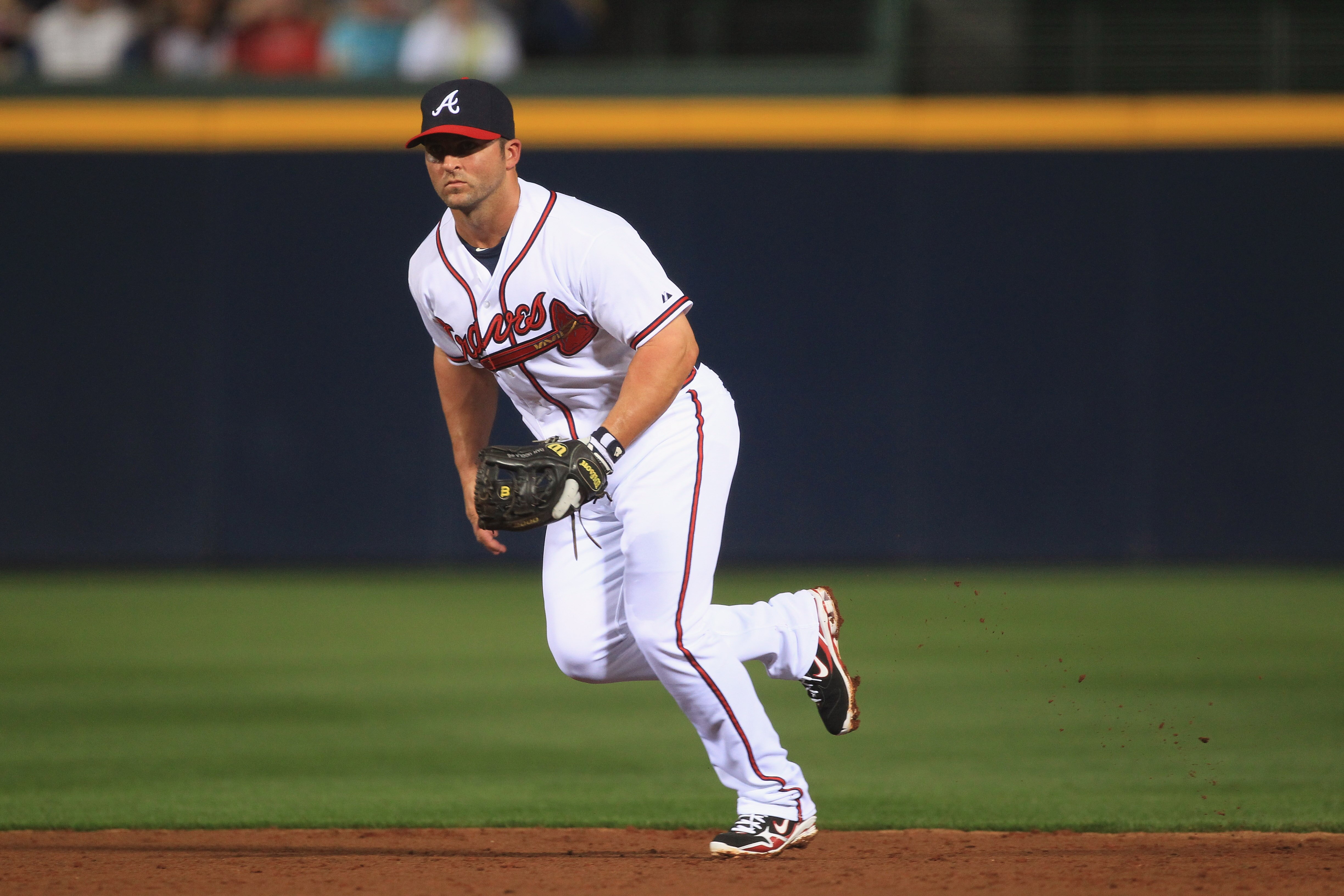 ATLANTA, GA - APRIL 08:  Dan Uggla #26 of the Atlanta Braves during their opening day game against the Philadelphia Phillies at Turner Field on April 8, 2011 in Atlanta, Georgia.  (Photo by Streeter Lecka/Getty Images)