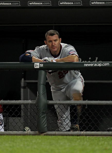 CHICAGO - AUGUST 10: Jim Thome #25 of the Minnesota Twins watches from the dugout as his teammates take on the Chicago White Sox at U.S. Cellular Field on August 10, 2010 in Chicago, Illinois. The Twins defeated the White Sox 12-6. (Photo by Jonathan Dani
