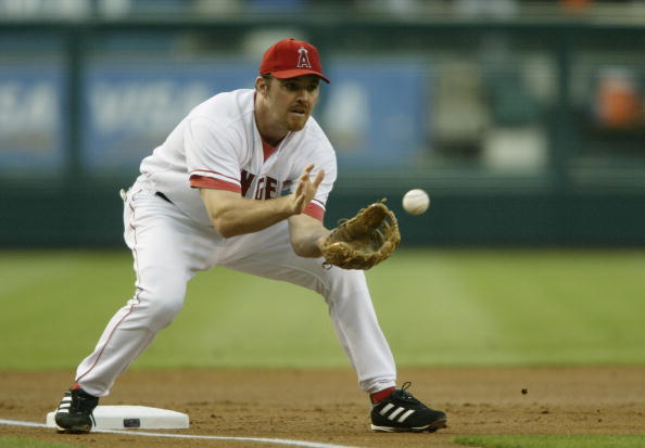 ANAHEIM, CA - JULY 30:  Third baseman Scott Spiezio #23 of the Anaheim Angels catches the ball during the MLB game against the New York Yankees at Edison Field on July 30, 2003 in Anaheim, California. Roger Clemens threw a shut-out as the Yankees defeated