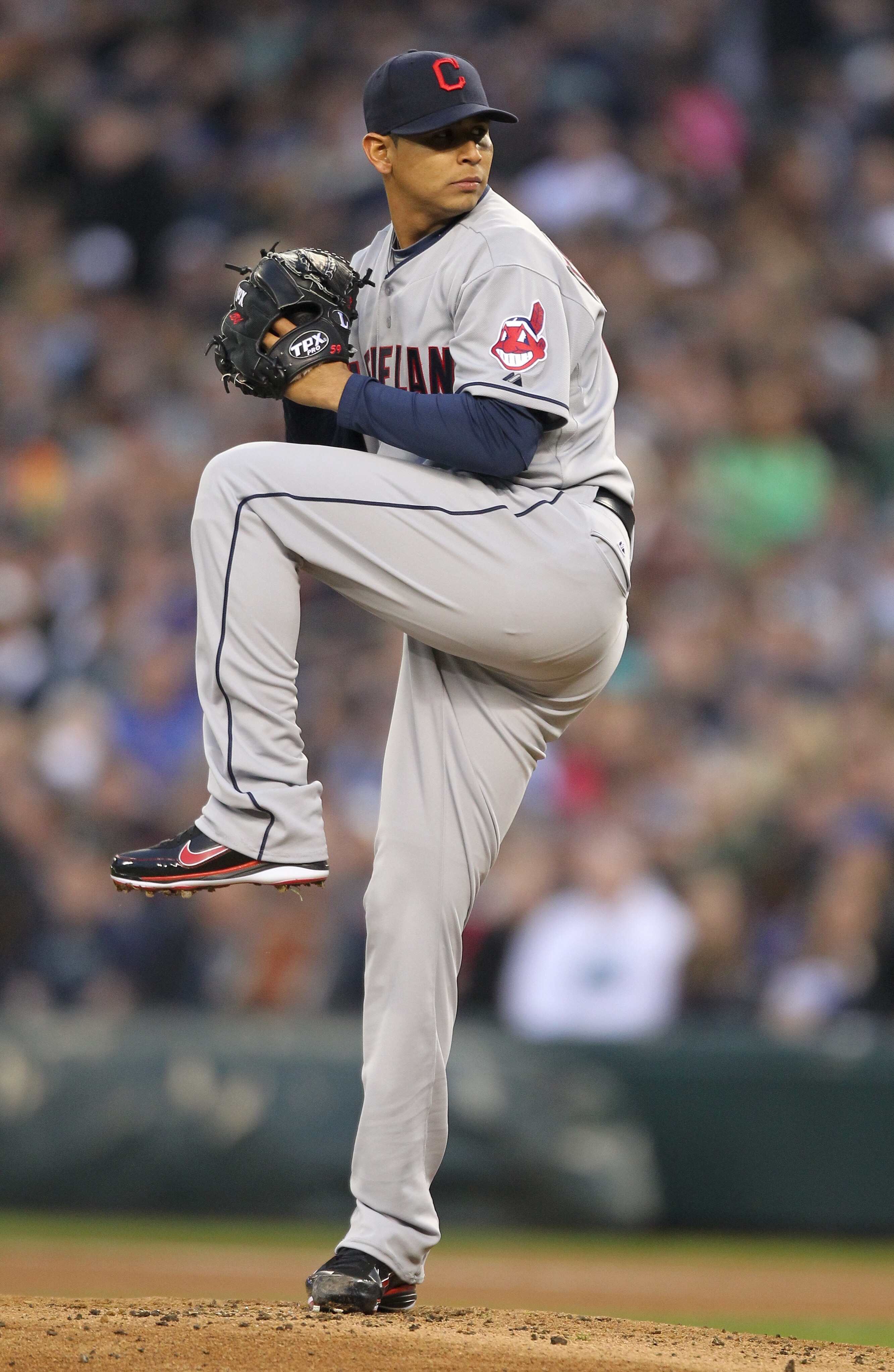 SEATTLE, WA - APRIL 08:  Starting pitcher Carlos Carrasco #59 of the Cleveland Indians pitches against the Seattle Mariners during the Mariners' home opener at Safeco Field on April 8, 2011 in Seattle, Washington. (Photo by Otto Greule Jr/Getty Images)