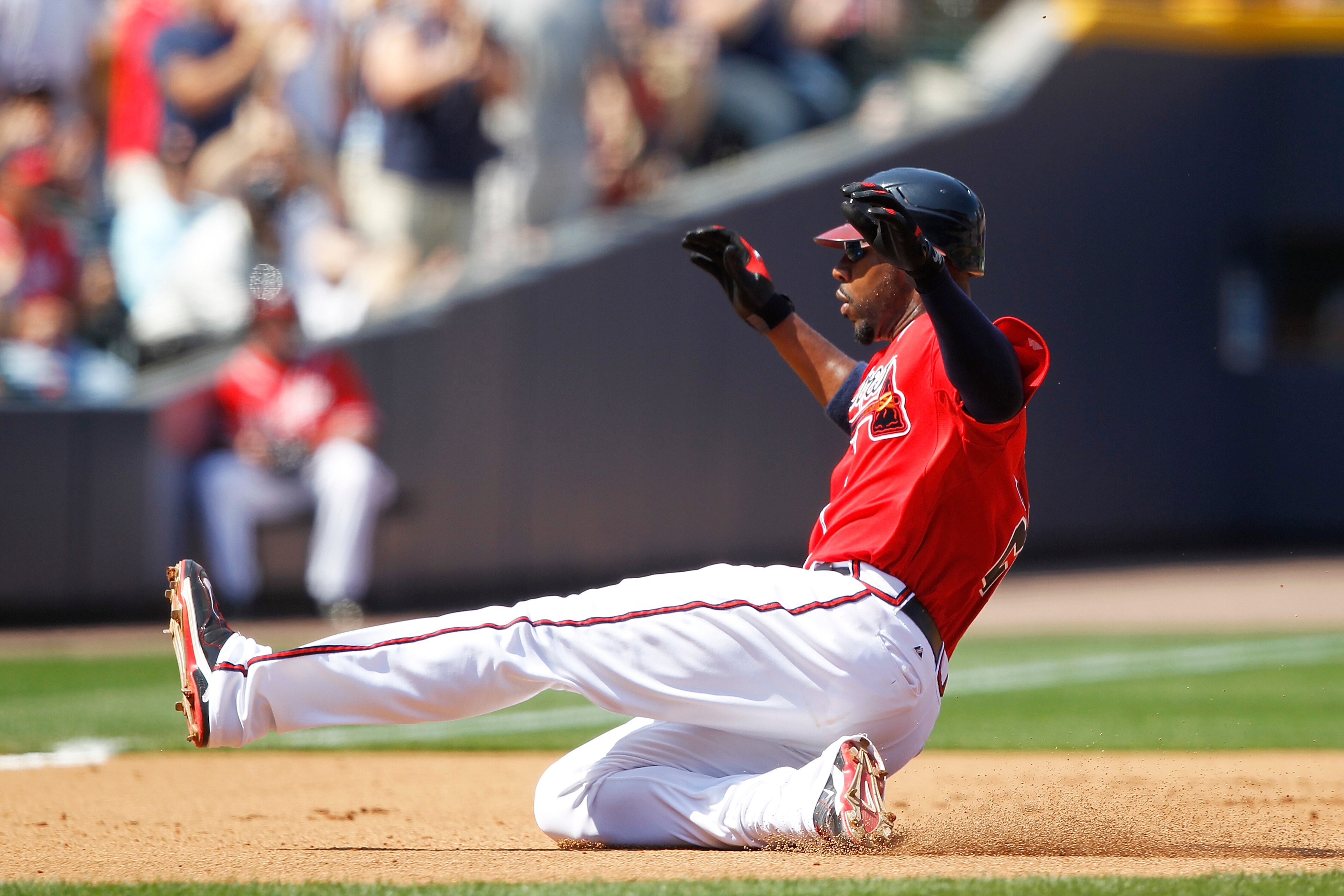 ATLANTA, GA - APRIL 10: Jason Heyward #22 of the Atlanta Braves slides at third base against the Philadelphia Phillies at Turner Field on April 10, 2011 in Atlanta, Georgia. The Phillies won 3-0. (Photo by Joe Robbins/Getty Images)