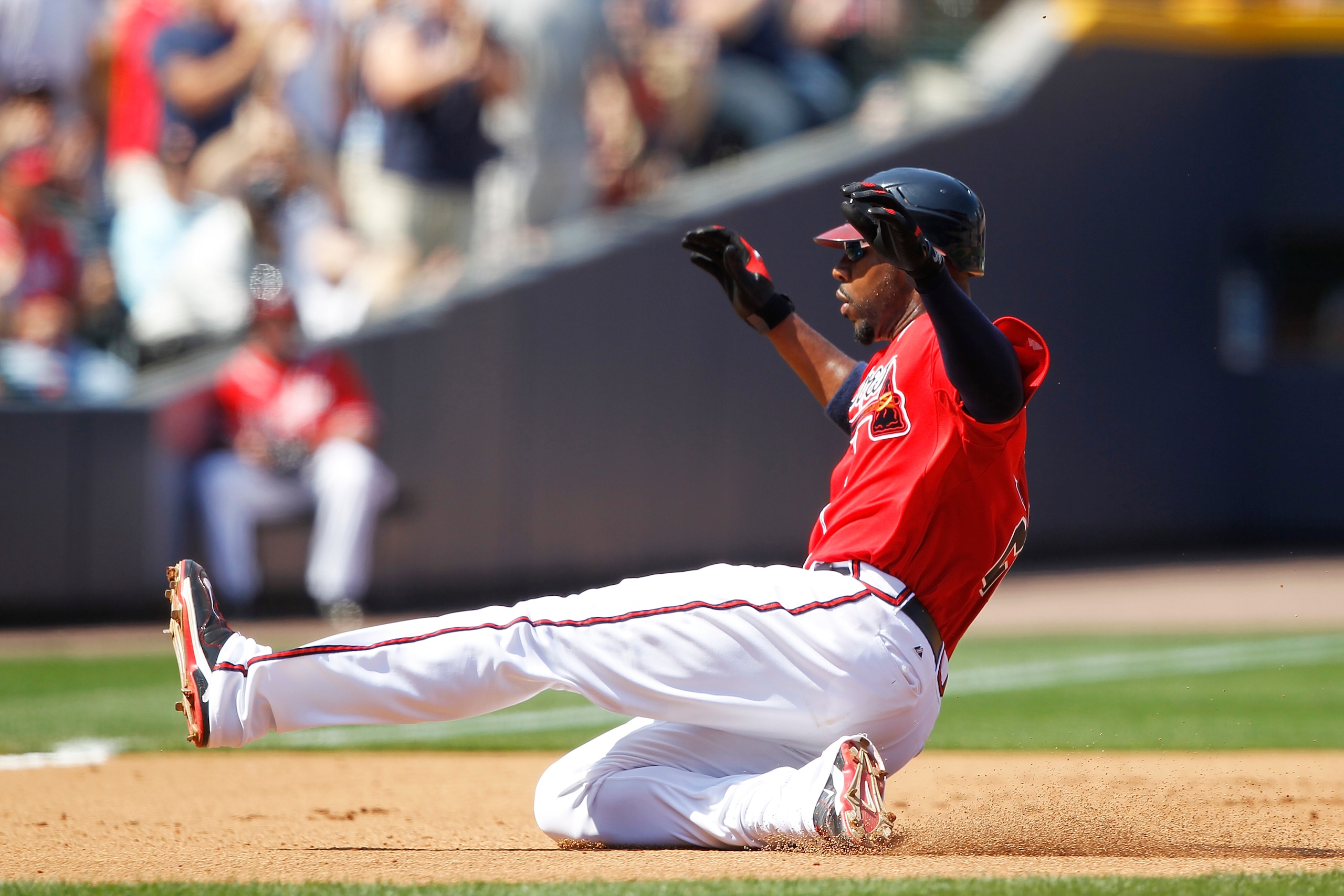 ATLANTA, GA - APRIL 10: Jason Heyward #22 of the Atlanta Braves slides at third base against the Philadelphia Phillies at Turner Field on April 10, 2011 in Atlanta, Georgia. The Phillies won 3-0. (Photo by Joe Robbins/Getty Images)