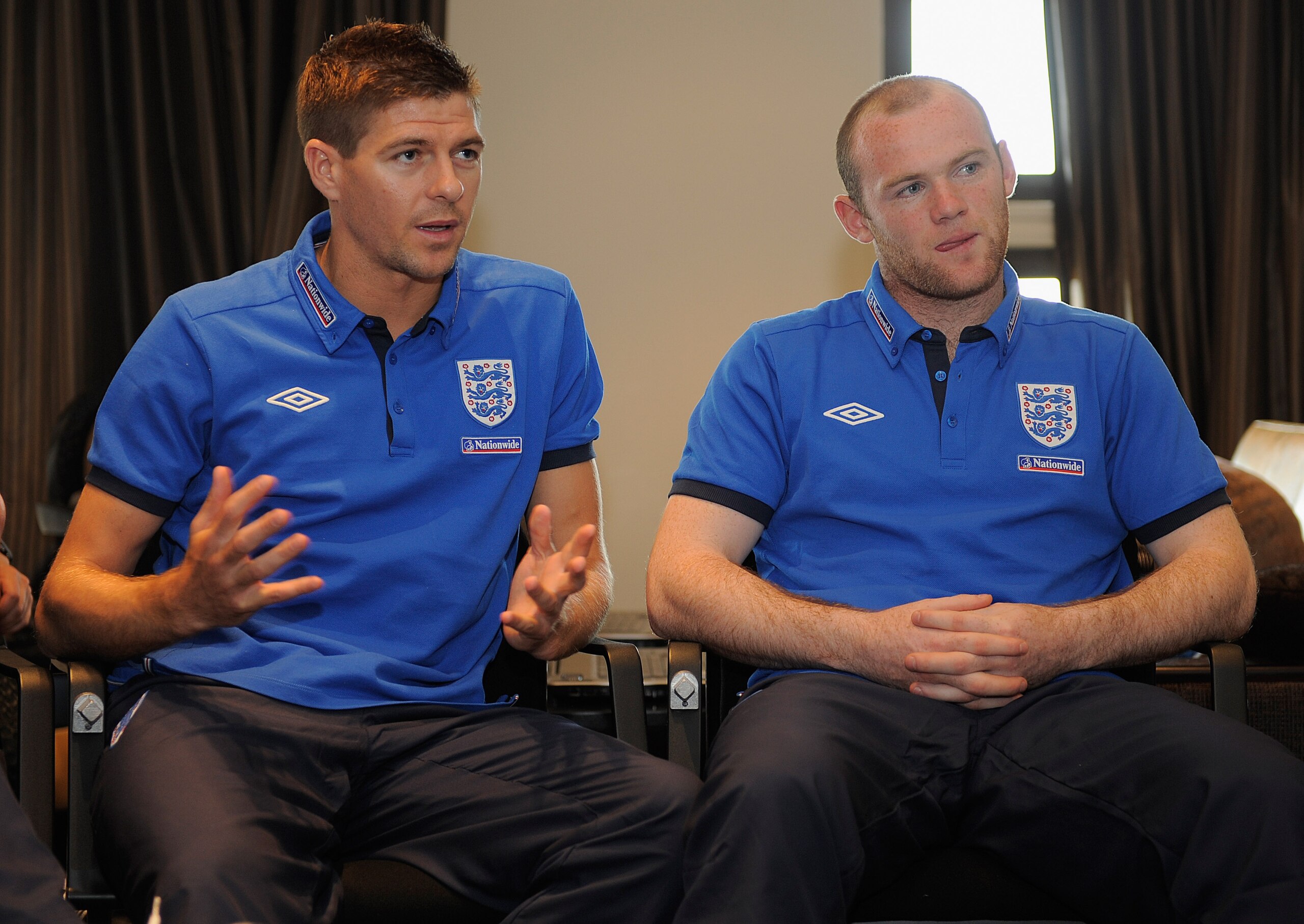 RUSTENBURG, SOUTH AFRICA - JUNE 04: Wayne Rooney (R) and Steven Gerrard speak to Prince William via video link after the England training session at the Royal Bafokeng Sports Campus on June 4, 2010 in Rustenburg, South Africa.  (Photo by Michael Regan/Get