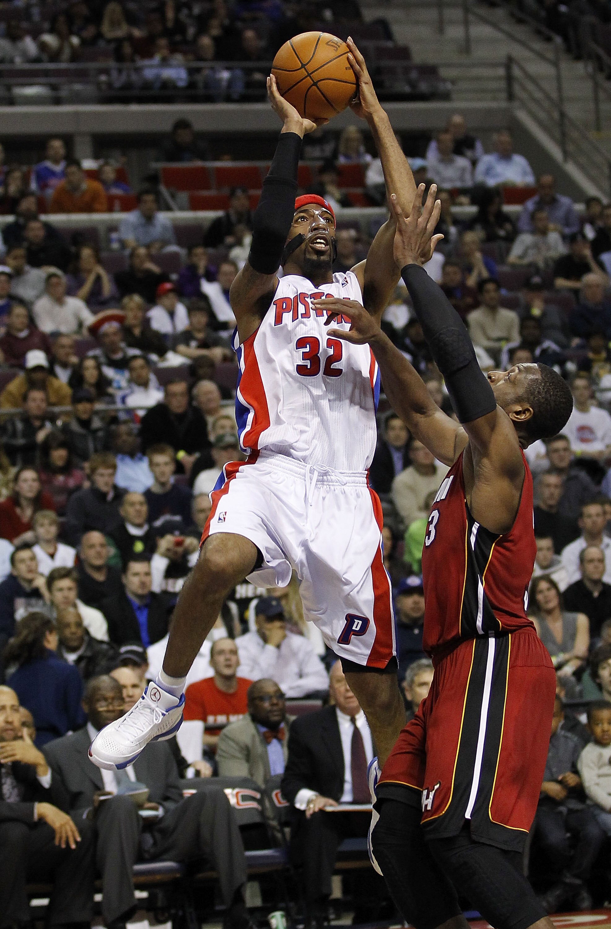 AUBURN HILLS, MI - MARCH 23:  Richard Hamilton #32 of the Detroit Pistons gets a shot off over Dwyane Wade #3 of the Miami Heat at The Palace of Auburn Hills on March 23, 2011 in Auburn Hills, Michigan. Miami won the game 100-94. NOTE TO USER: User expres
