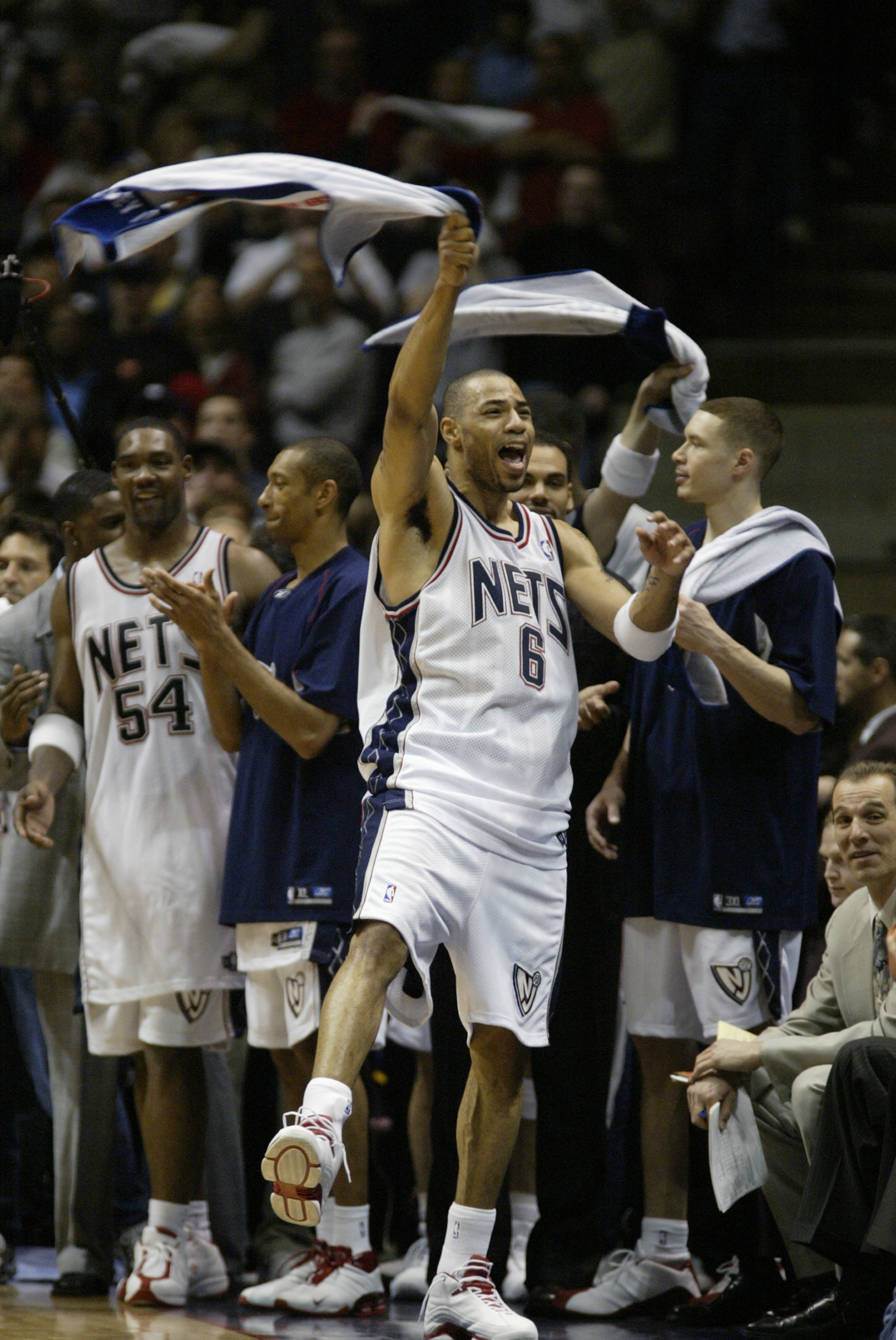 EAST RUTHERFORD, NJ - MAY 24:  Kenyon Martin #6 of the New Jersey Nets celebrates in Game four of the Eastern Conference Finals during the 2003 NBA Playoffs against the Detroit Pistons at Continental Airlines Arena on May 24, 2003 in East Rutherford, New