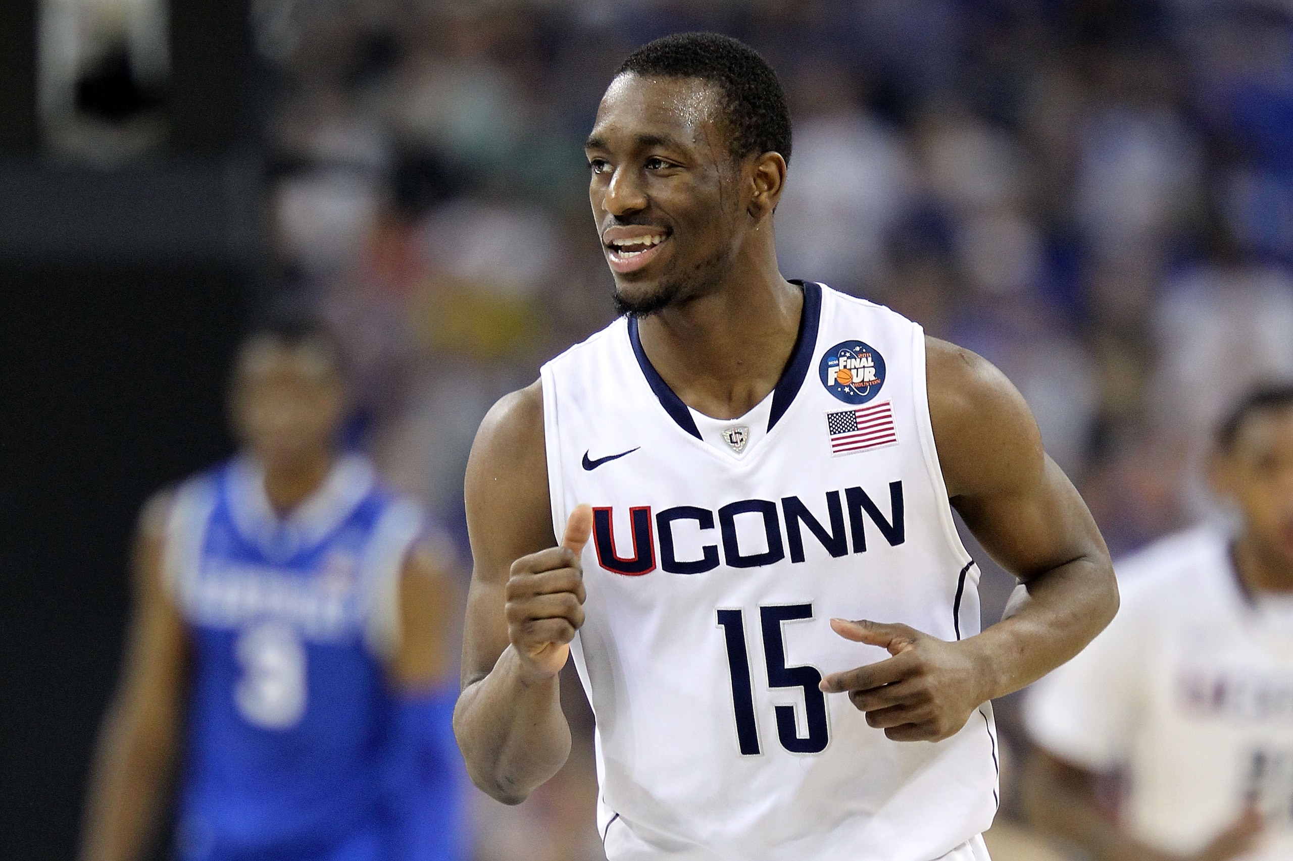 HOUSTON, TX - APRIL 02: Kemba Walker #15 of the Connecticut Huskies reacts after a play against the Kentucky Wildcats during the National Semifinal game of the 2011 NCAA Division I Men's Basketball Championship at Reliant Stadium on April 2, 2011 in Hous HOUSTON, TX - APRIL 02: Kemba Walker #15 of the Connecticut Huskies reacts after a play against the Kentucky Wildcats during the National Semifinal game of the 2011 NCAA Division I Men's Basketball Championship at Reliant Stadium on April 2, 2011 in Hous