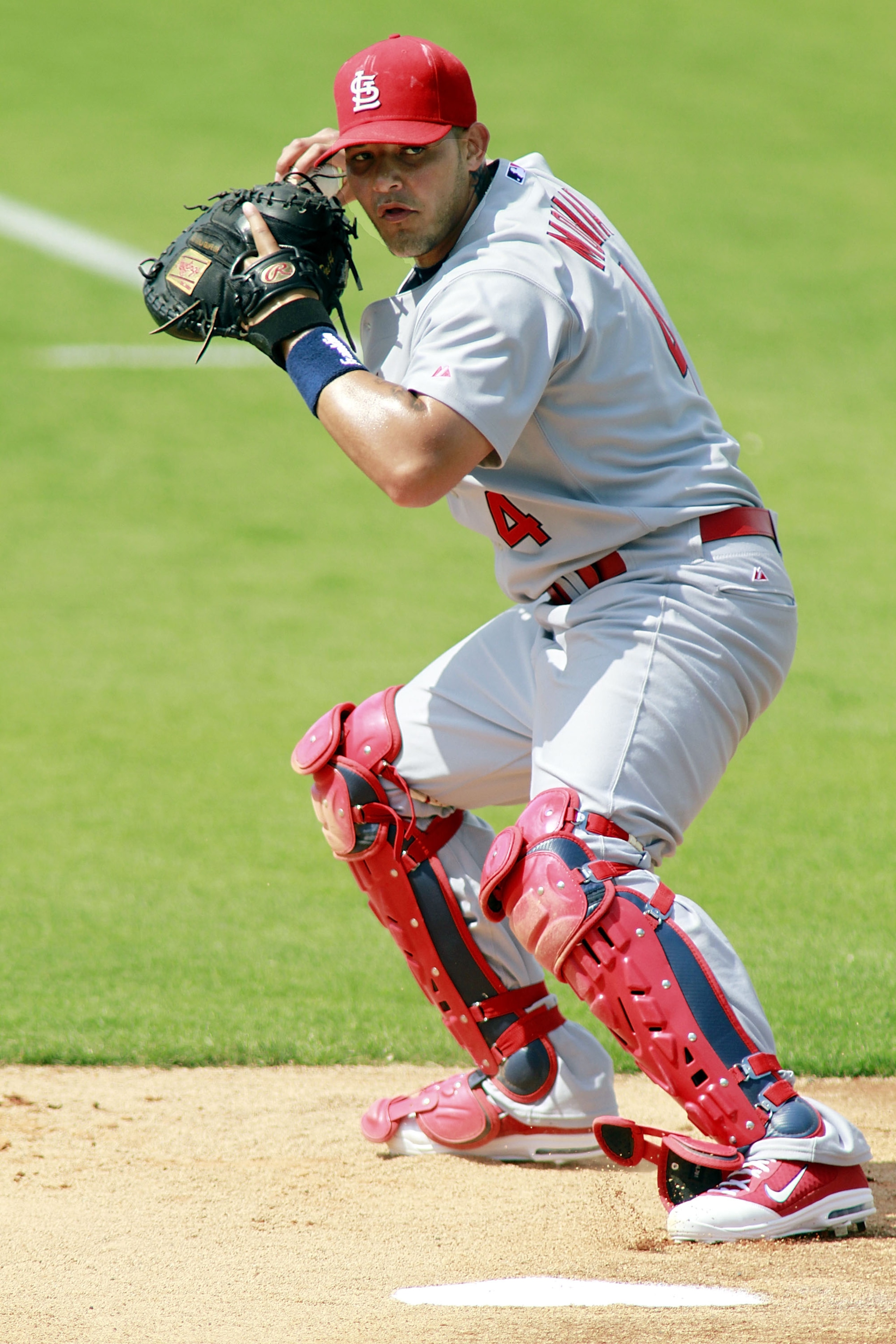 JUPITER, FL - MARCH 01: Catcher Yadier Molina of the St. Louis Cardinals prepares for the Florida Marlins at Roger Dean Stadium on March 1, 2011 in Jupiter, Florida. (Photo by Marc Serota/Getty Images) JUPITER, FL - MARCH 01: Catcher Yadier Molina of the St. Louis Cardinals prepares for the Florida Marlins at Roger Dean Stadium on March 1, 2011 in Jupiter, Florida. (Photo by Marc Serota/Getty Images)