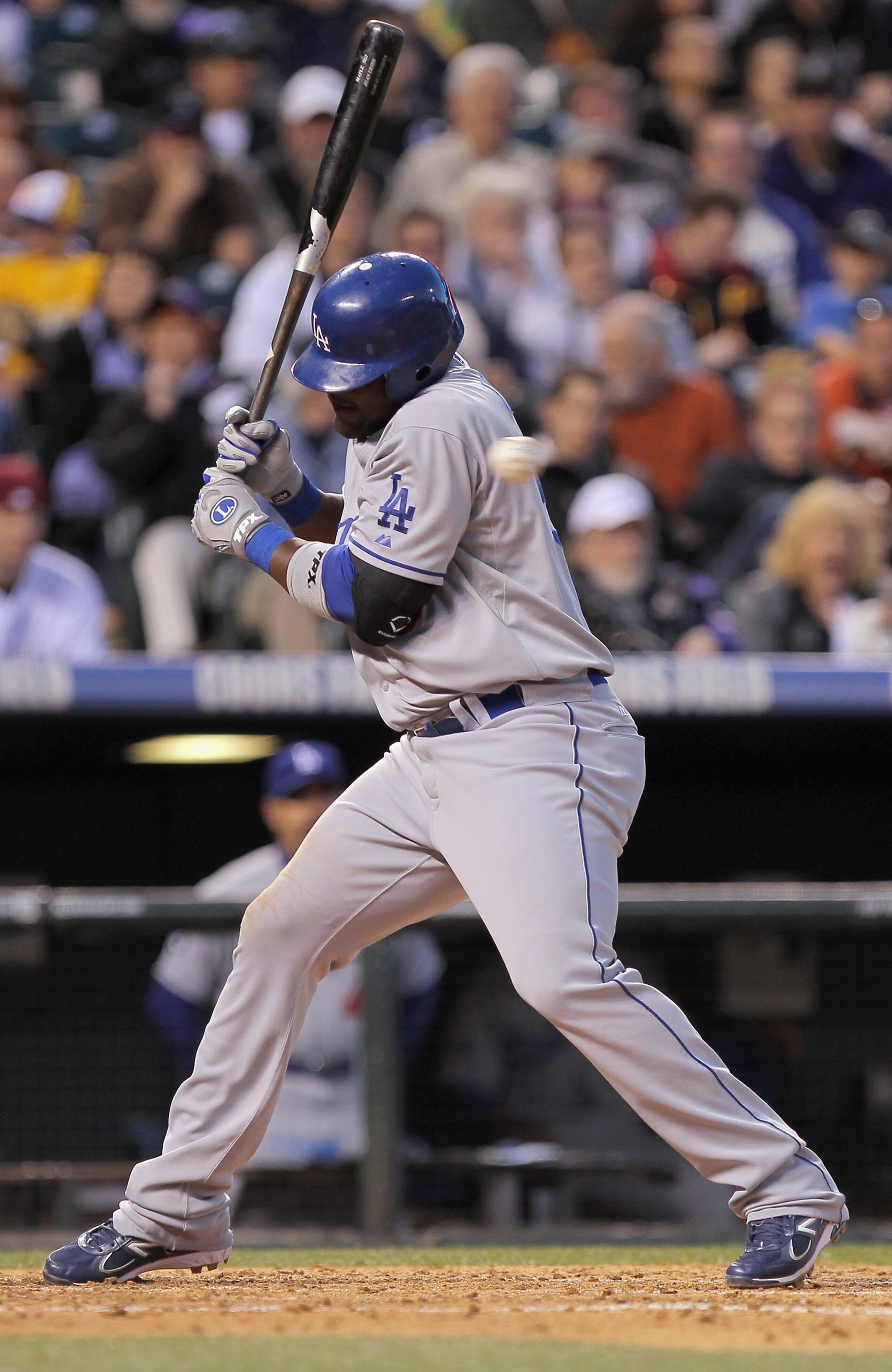 DENVER, CO - APRIL 05: Juan Uribe #5 of the Los Angeles Dodgers dodges an inside pitch from Jhoulys Chacin #45 of the Colorado Rockies at Coors Field on April 5, 2011 in Denver, Colorado. (Photo by Doug Pensinger/Getty Images) DENVER, CO - APRIL 05: Juan Uribe #5 of the Los Angeles Dodgers dodges an inside pitch from Jhoulys Chacin #45 of the Colorado Rockies at Coors Field on April 5, 2011 in Denver, Colorado. (Photo by Doug Pensinger/Getty Images)