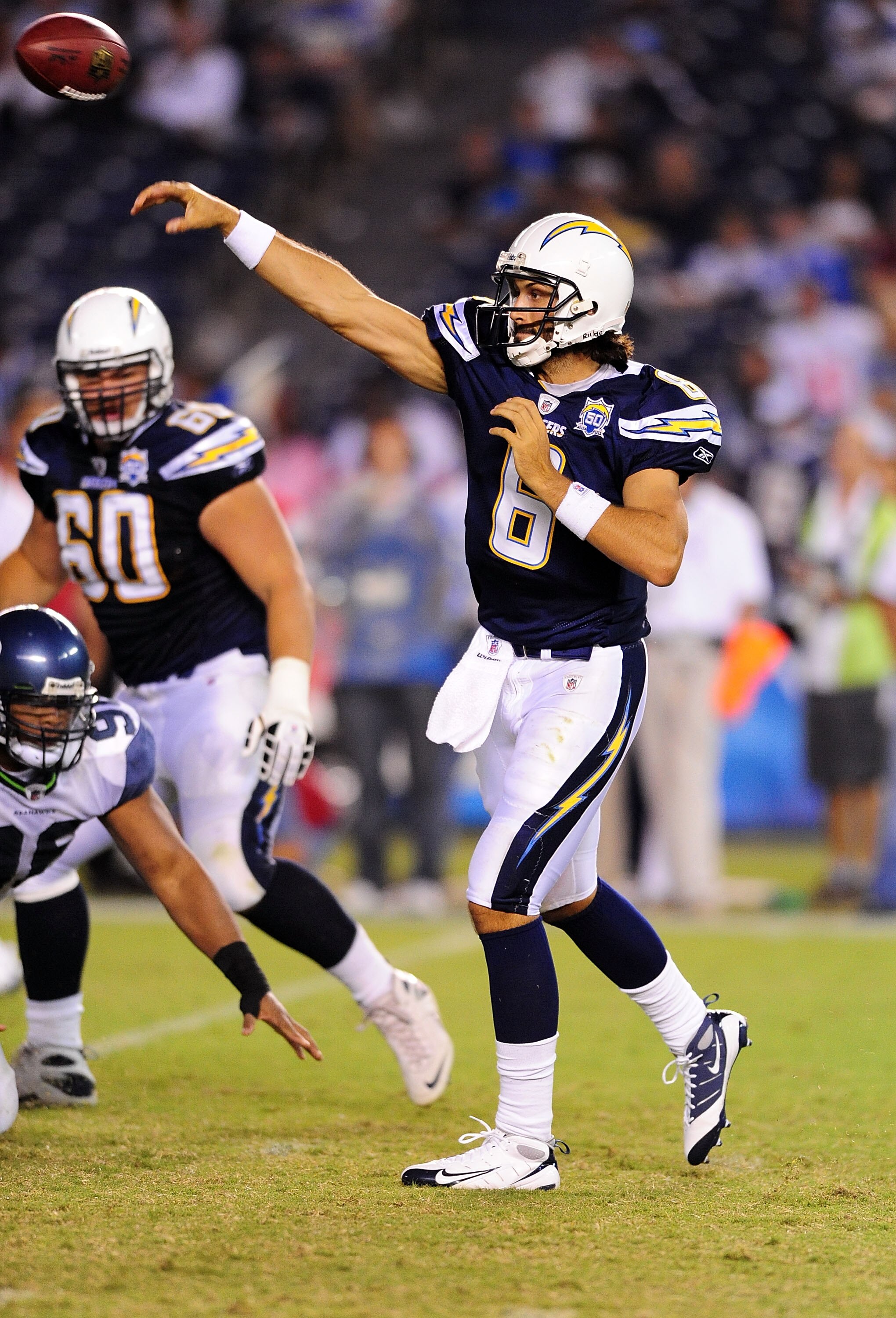 SAN DIEGO - AUGUST 15:  Charlie Whitehurst #6 of the San Diego Chargers throws the ball to teamate while playing the Seattle Seahawks during the preseason game on August 15, 2009 at Qualcomm Stadium in San Diego, California.  (Photo by Jacob de Golish/Get