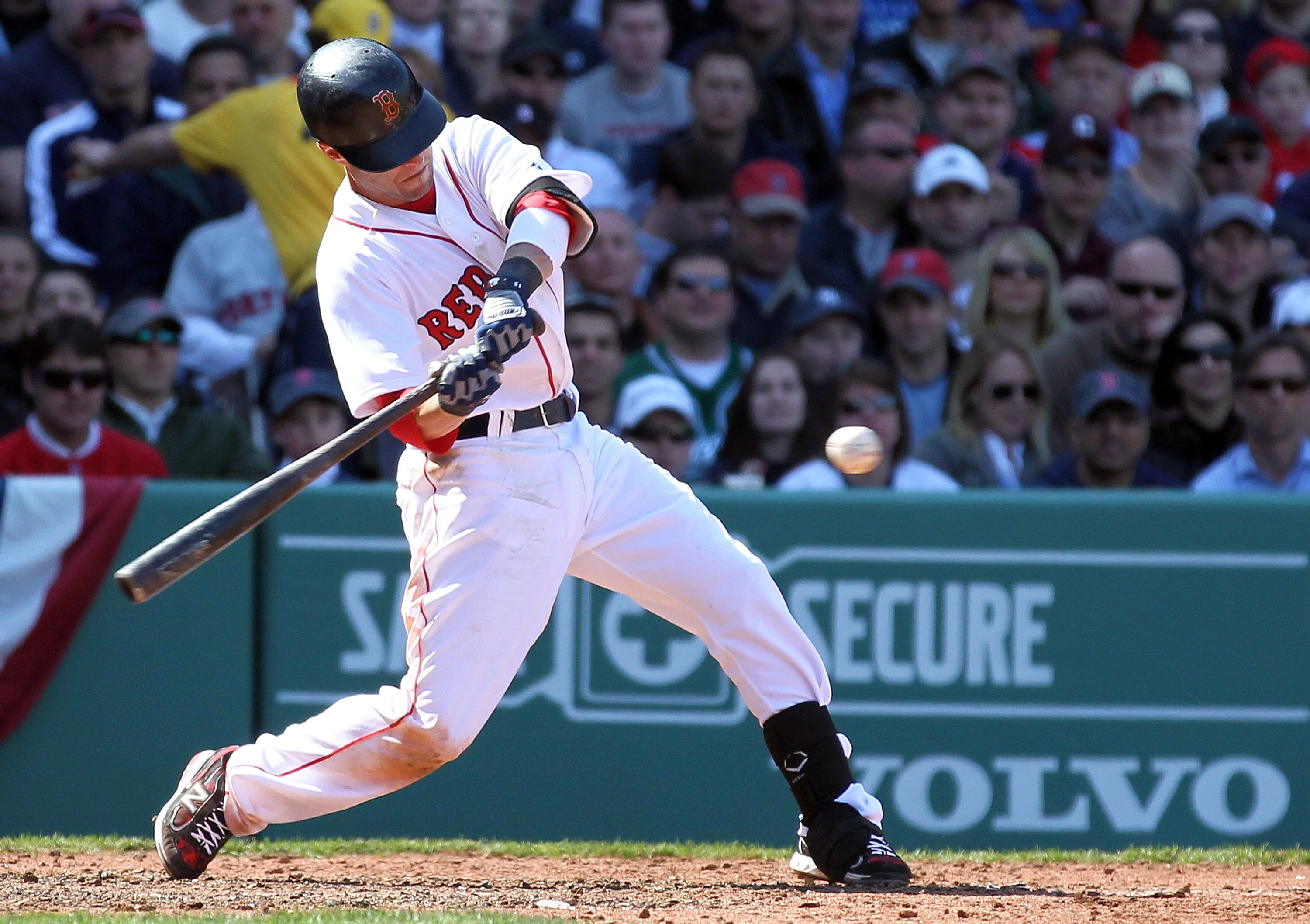 BOSTON, MA - APRIL 9:  Dustin Pedroia #15 of the Boston Red Sox knocks in two runs in the fourth inning against the New York Yankees at Fenway Park April 9, 2011 in Boston, Massachusetts. (Photo by Jim Rogash/Getty Images)