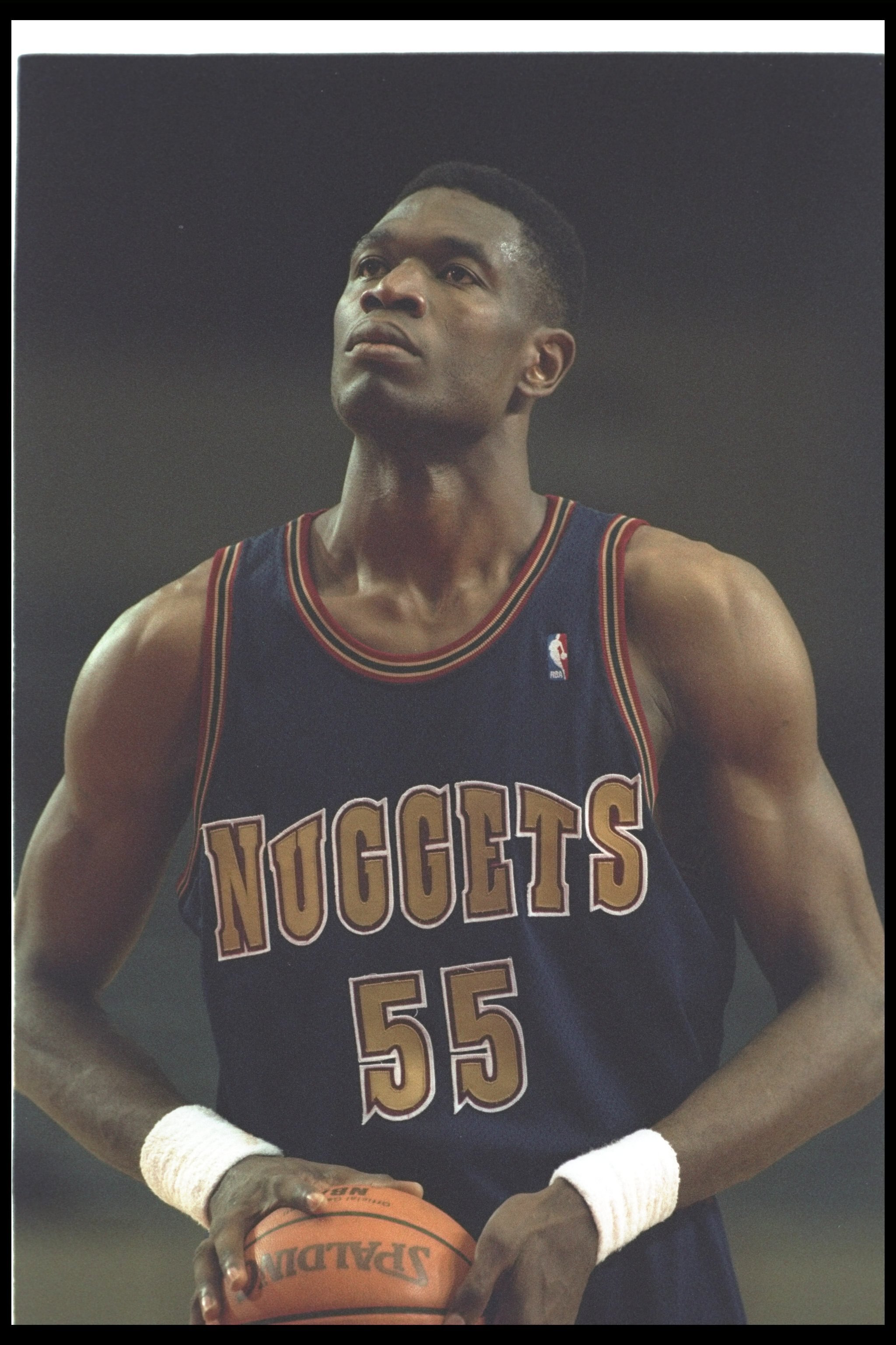 19 Oct 1994: Center Dikembe Mutombo of the Denver Nuggets looks on during a pre-season game against the Los Angeles Clippers at the Sports Arena in Los Angeles, California. The Nuggets won the game, 96-90.