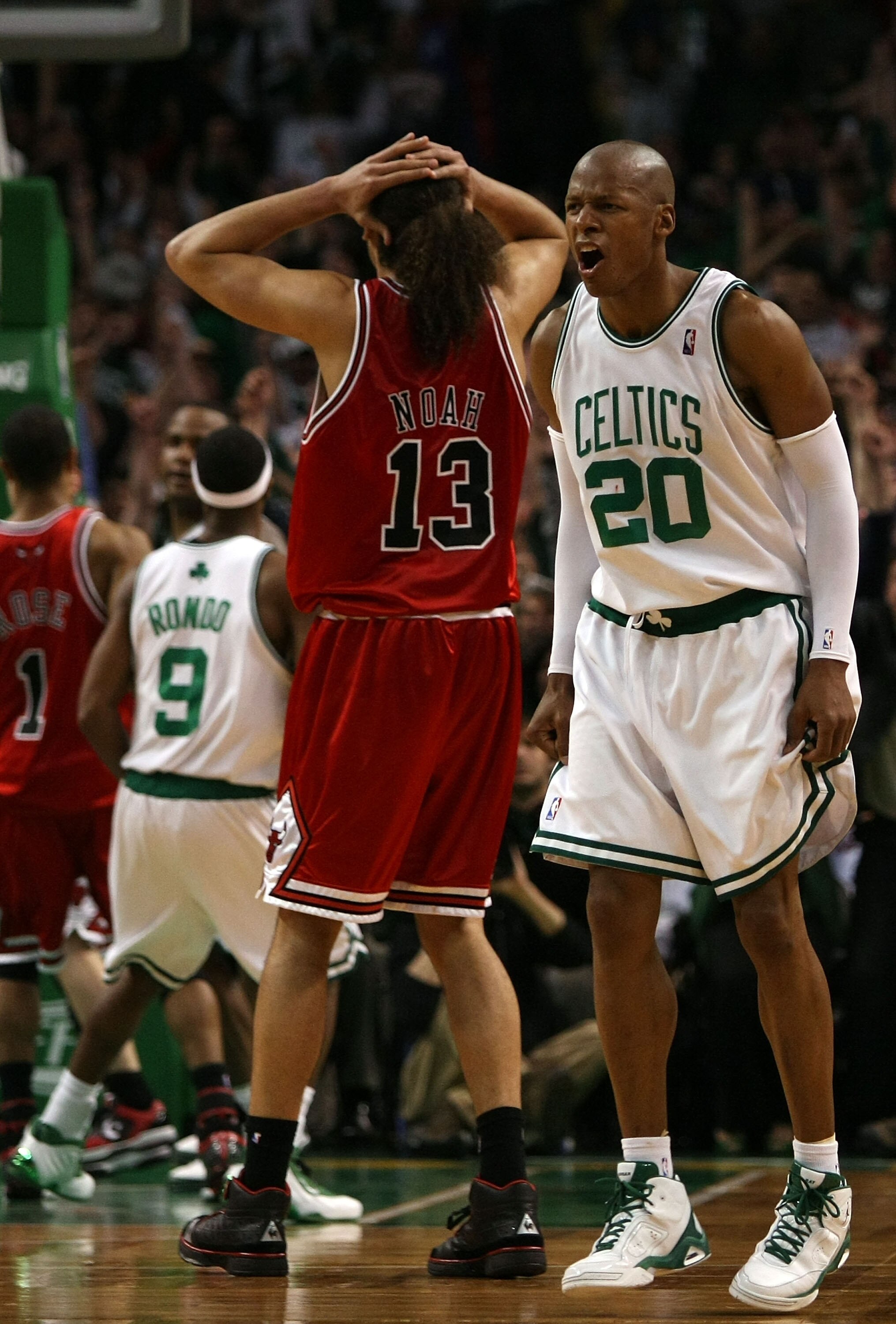 BOSTON - APRIL 20:  Ray Allen #20 of the Boston Celtics reacts after he sinks his last second game winning basket as Joakim Noah #13 of the Chicago Bulls reacts to the loss in Game Two of the Eastern Conference Quarterfinals during the 2009 NBA Playoffs a