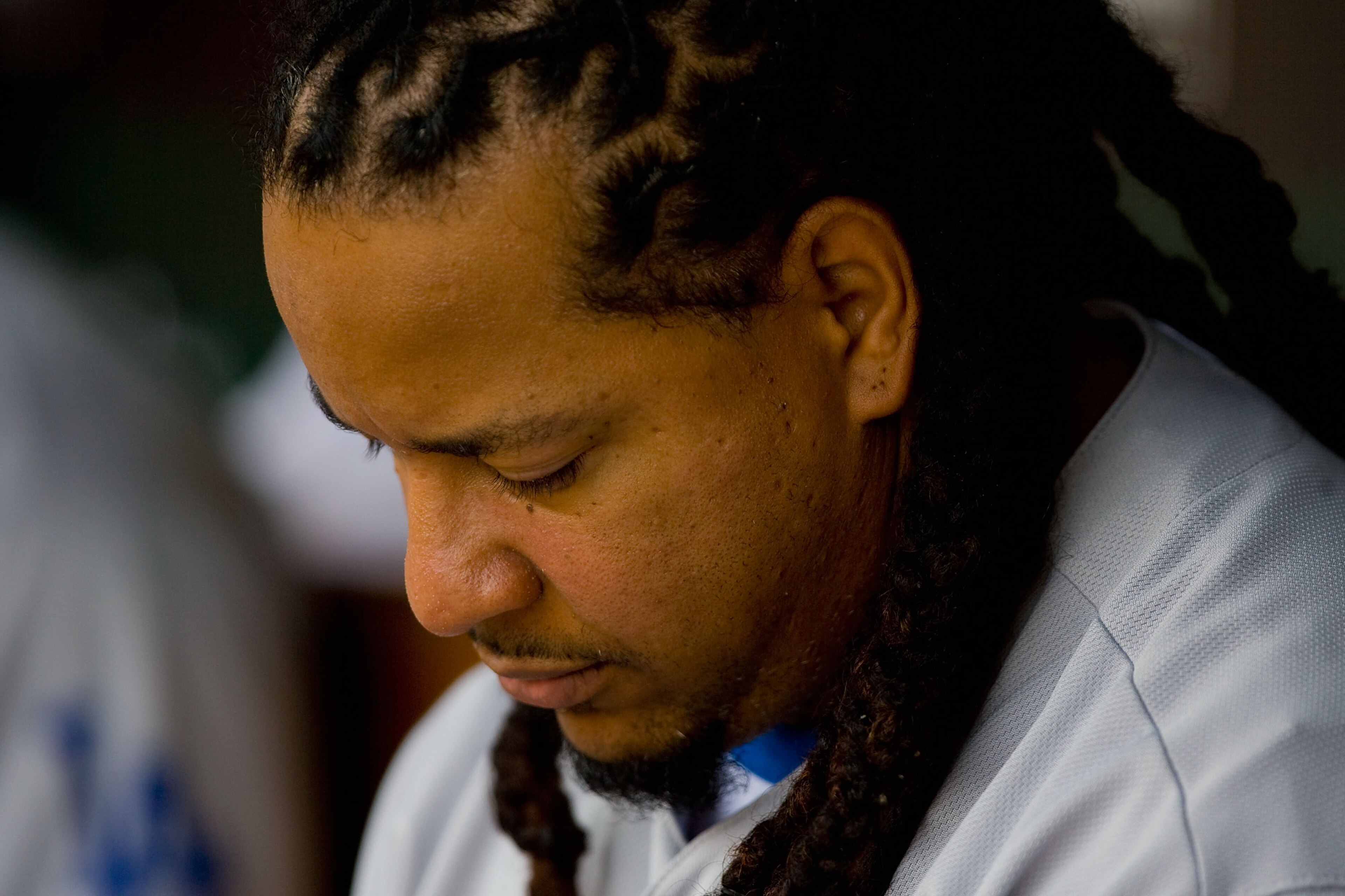 ST. LOUIS - JULY 18: Manny Ramirez #99 of the Los Angeles Dodgers sits in the dugout against the St. Louis Cardinals at Busch Stadium on July 18, 2010 in St. Louis, Missouri. (Photo by Dilip Vishwanat/Getty Images) ST. LOUIS - JULY 18: Manny Ramirez #99 of the Los Angeles Dodgers sits in the dugout against the St. Louis Cardinals at Busch Stadium on July 18, 2010 in St. Louis, Missouri. (Photo by Dilip Vishwanat/Getty Images)